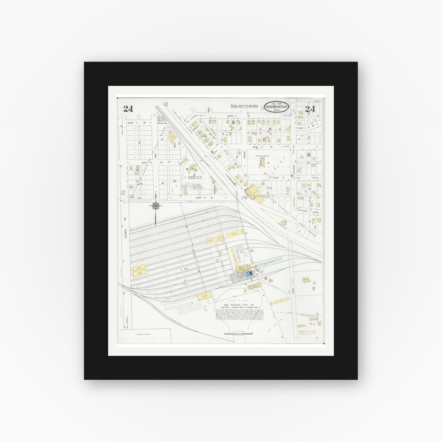 Old map wall art mockup — black gallery frame with white mat — Sanborn Fire Insurance Map from Iron Mountain, Dickinson County, Michigan (1930), Sheet #0024