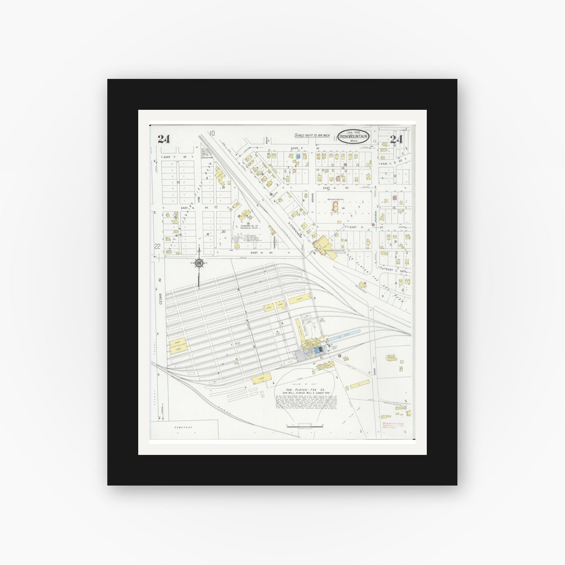 Old map wall art mockup — black gallery frame with white mat — Sanborn Fire Insurance Map from Iron Mountain, Dickinson County, Michigan (1930), Sheet #0024