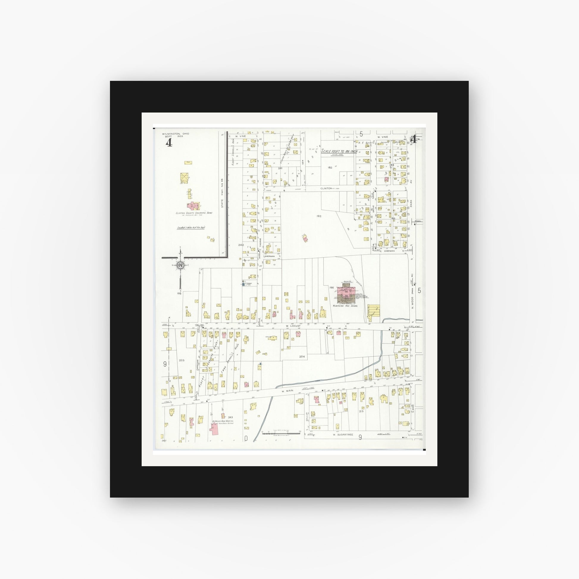 Old map wall art mockup — black gallery frame with white mat — Sanborn Fire Insurance Map from Wilmington, Clinton County, Ohio (1933), Sheet #0004