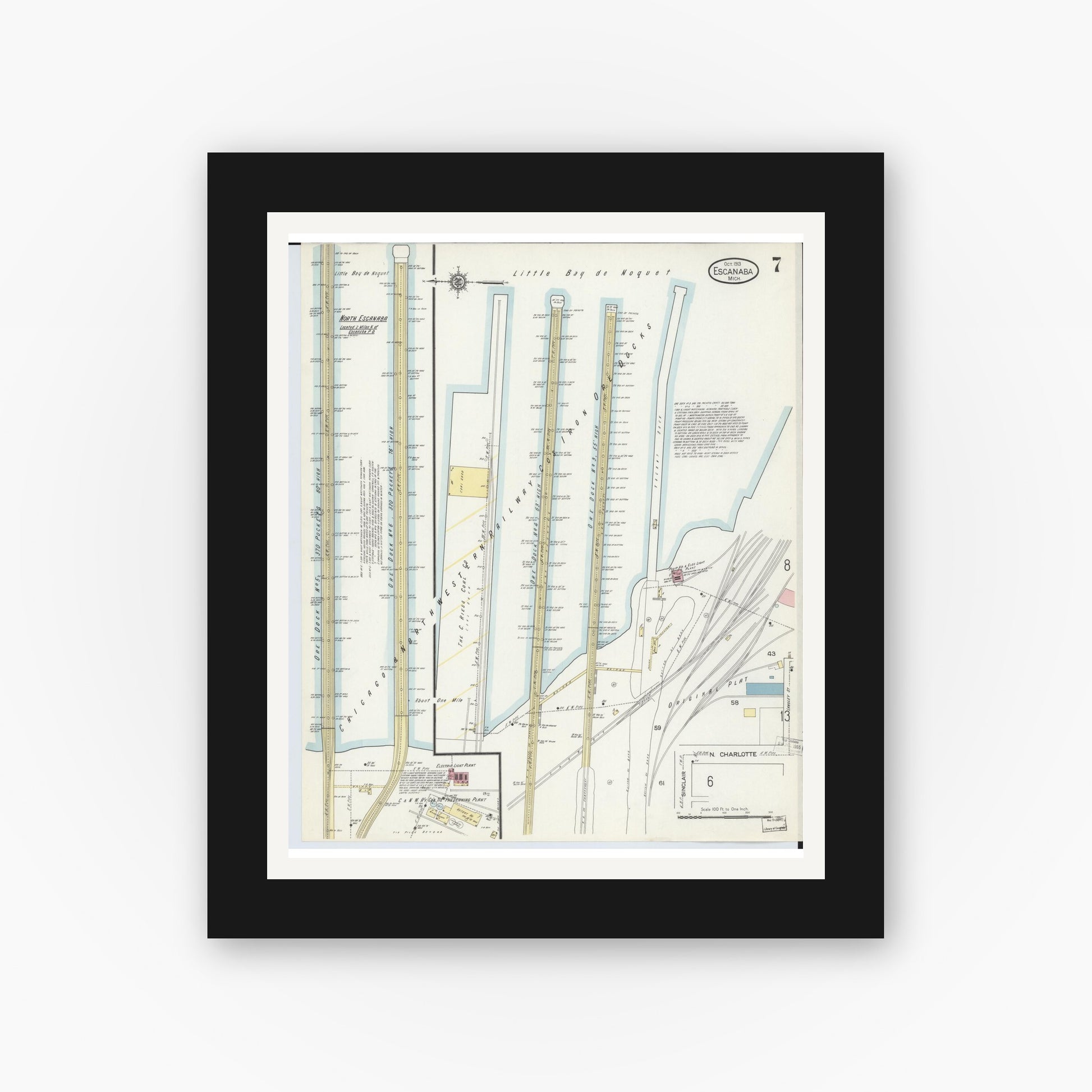Old map wall art mockup — black gallery frame with white mat — Sanborn Fire Insurance Map from Escanaba, Delta County, Michigan (1913), Sheet #0007