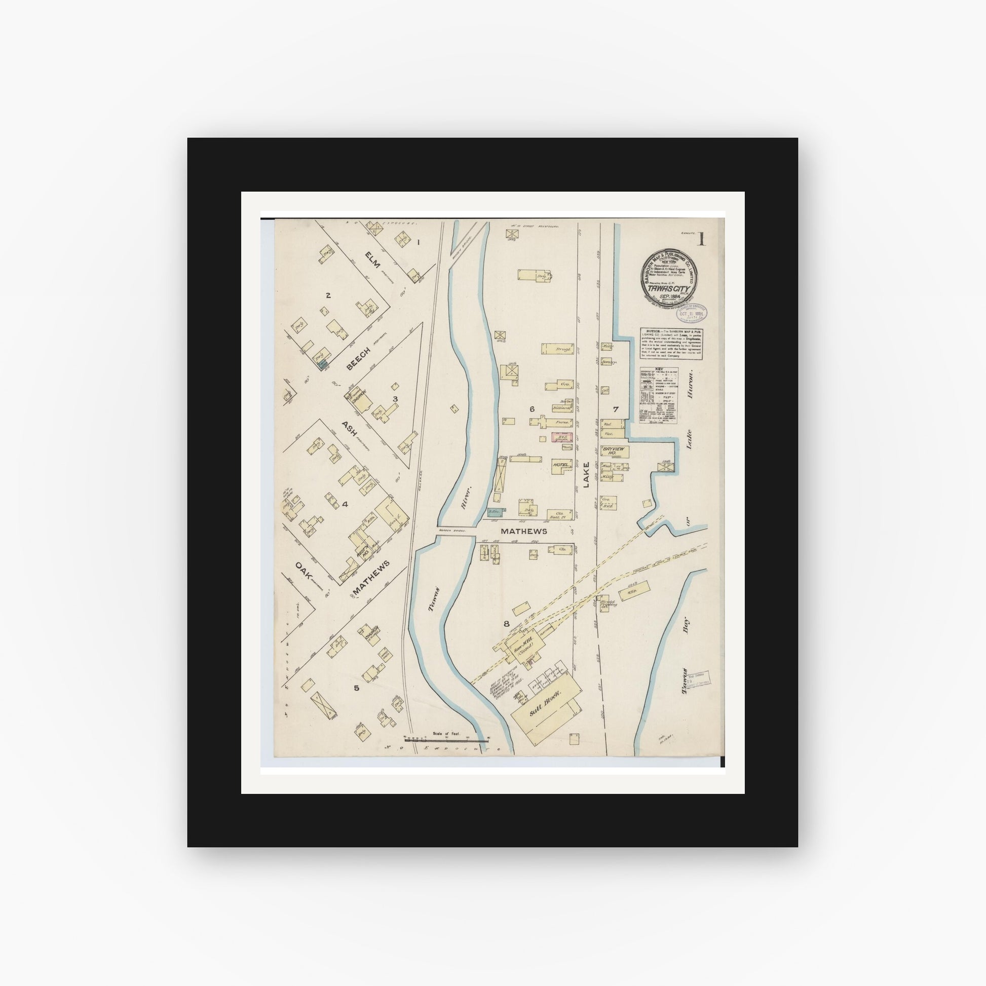 Old map wall art mockup — black gallery frame with white mat — Sanborn Fire Insurance Map from Tawas City, Iosco County, Michigan (1884) - Complete Map Set