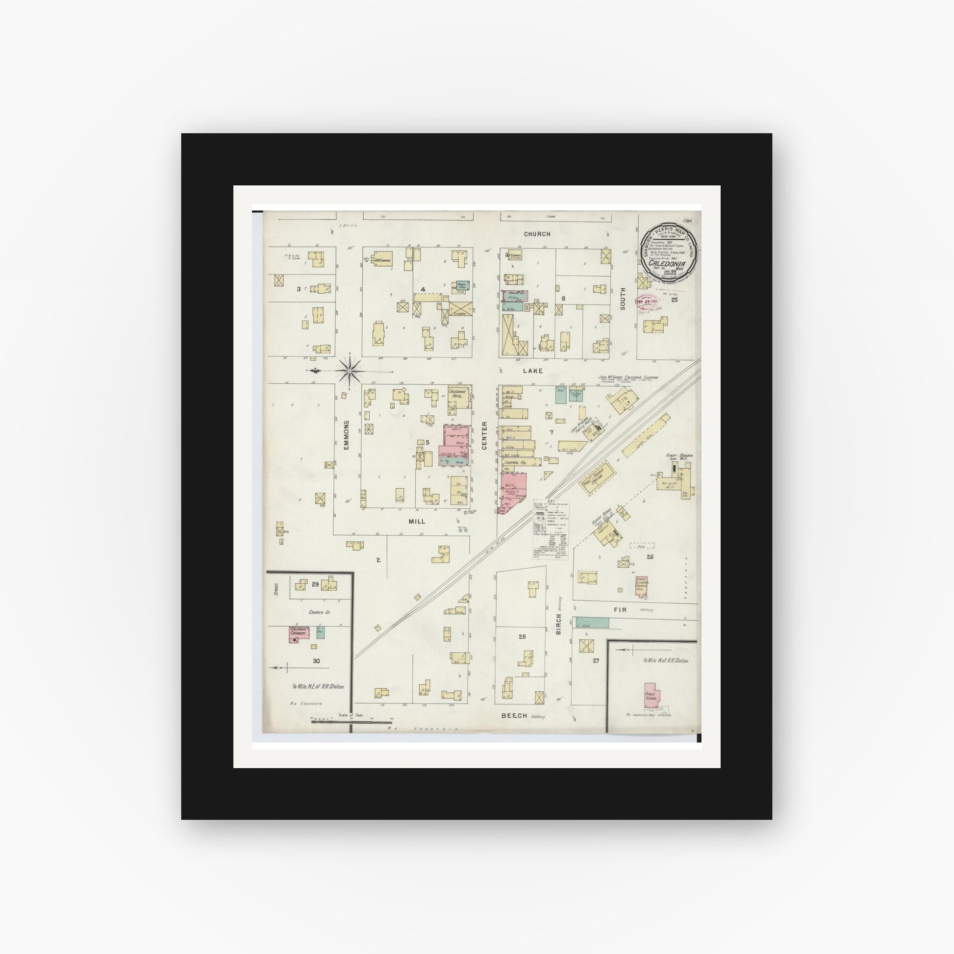Old map wall art mockup — black gallery frame with white mat — Sanborn Fire Insurance Map from Caledonia, Kent County, Michigan (1896), Sheet #0001