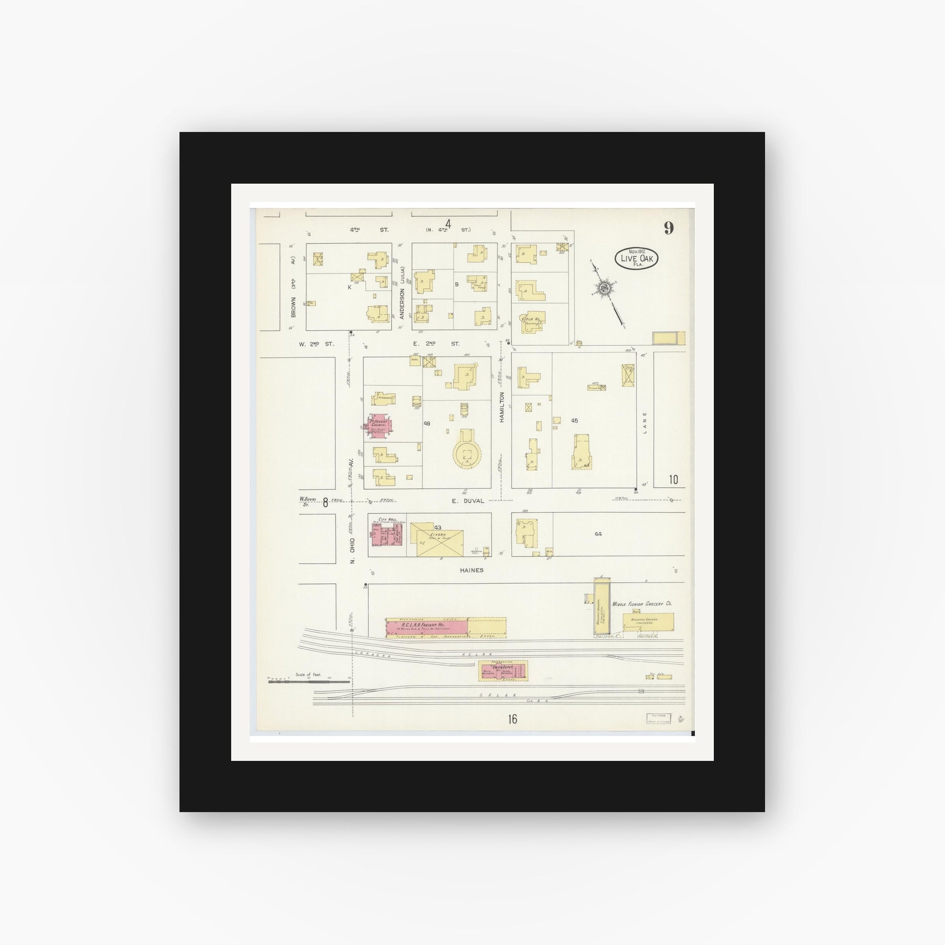 Old map wall art mockup — black gallery frame with white mat — Sanborn Fire Insurance Map from Live Oak, Suwanee County, Florida (1912), Sheet #0009