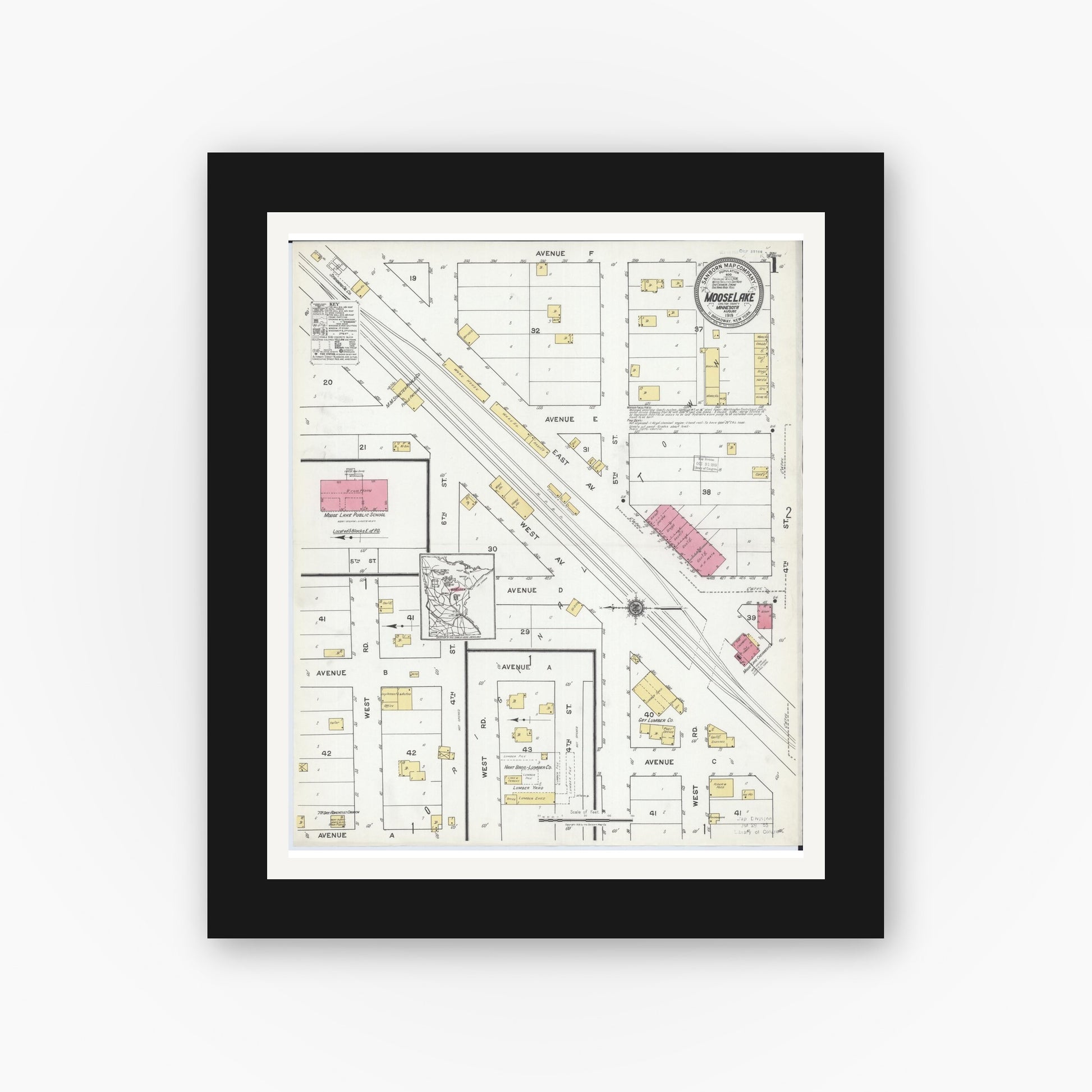 Old map wall art mockup — black gallery frame with white mat — Sanborn Fire Insurance Map from Moose Lake, Carlton County, Minnesota (1919) - Complete Map Set
