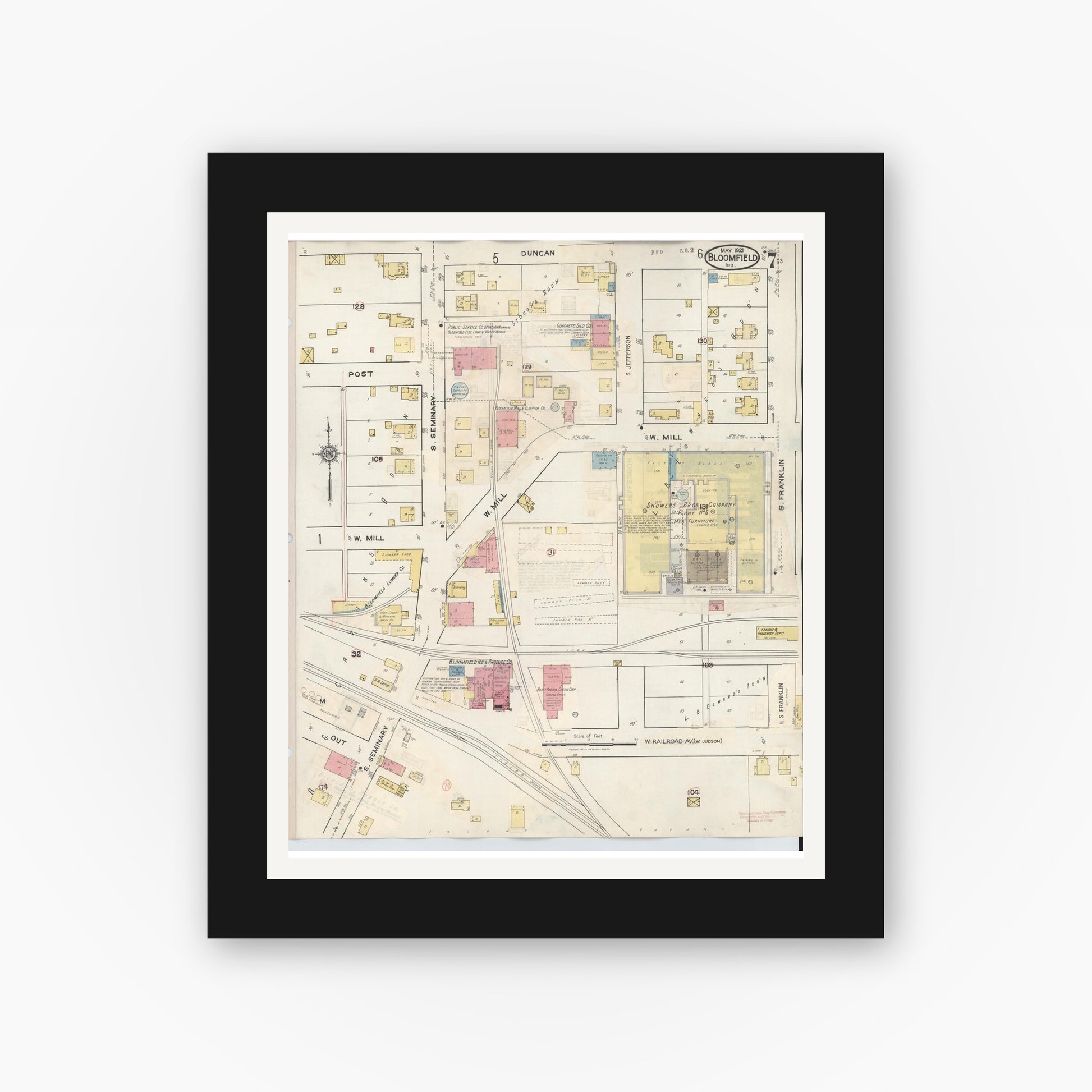 Old map wall art mockup — black gallery frame with white mat — Sanborn Fire Insurance Map from Bloomfield, Greene County, Indiana (1940), Sheet #0007