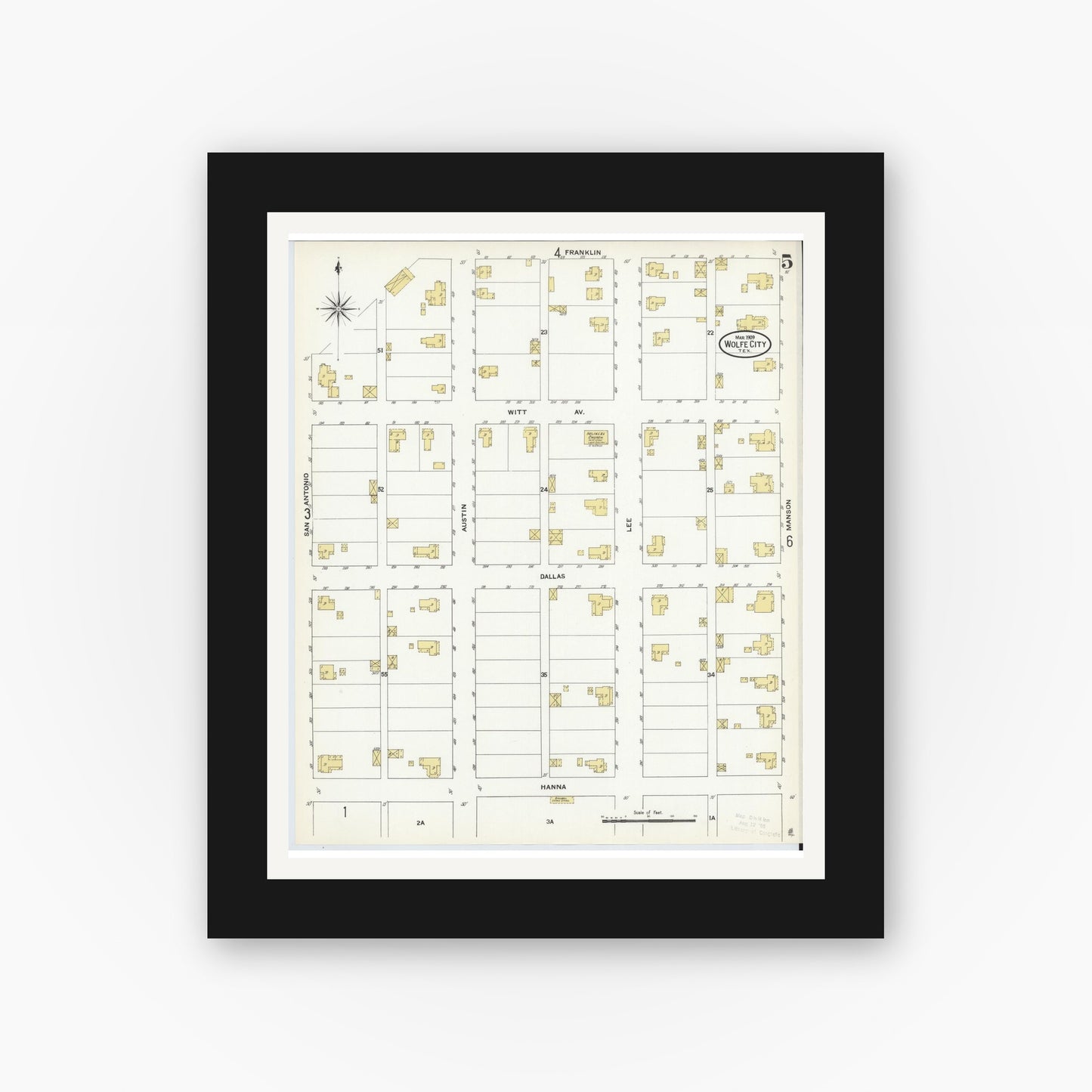Old map wall art mockup — black gallery frame with white mat — Sanborn Fire Insurance Map from Wolfe City, Hunt County, Texas (1909), Sheet #0005