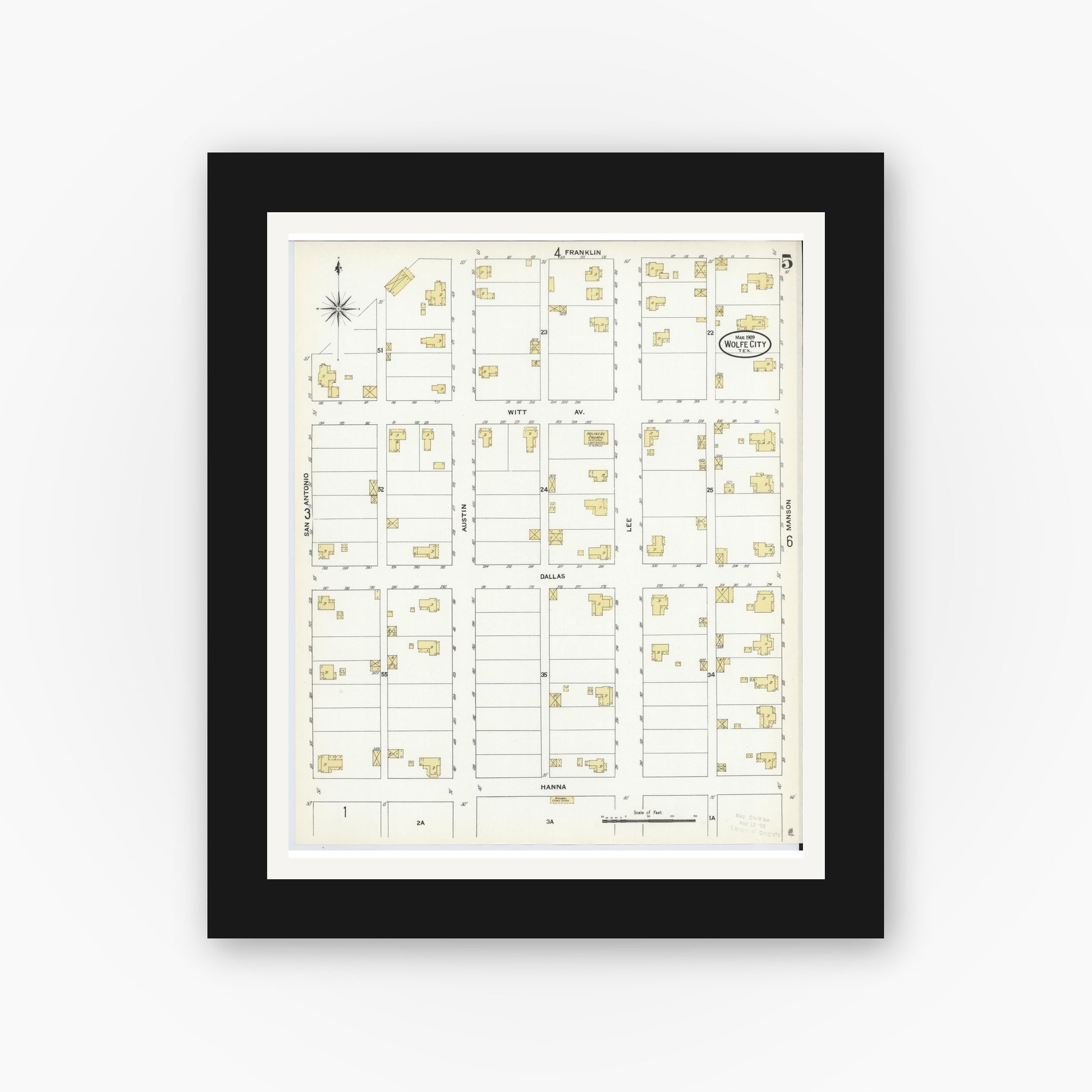 Old map wall art mockup — black gallery frame with white mat — Sanborn Fire Insurance Map from Wolfe City, Hunt County, Texas (1909), Sheet #0005