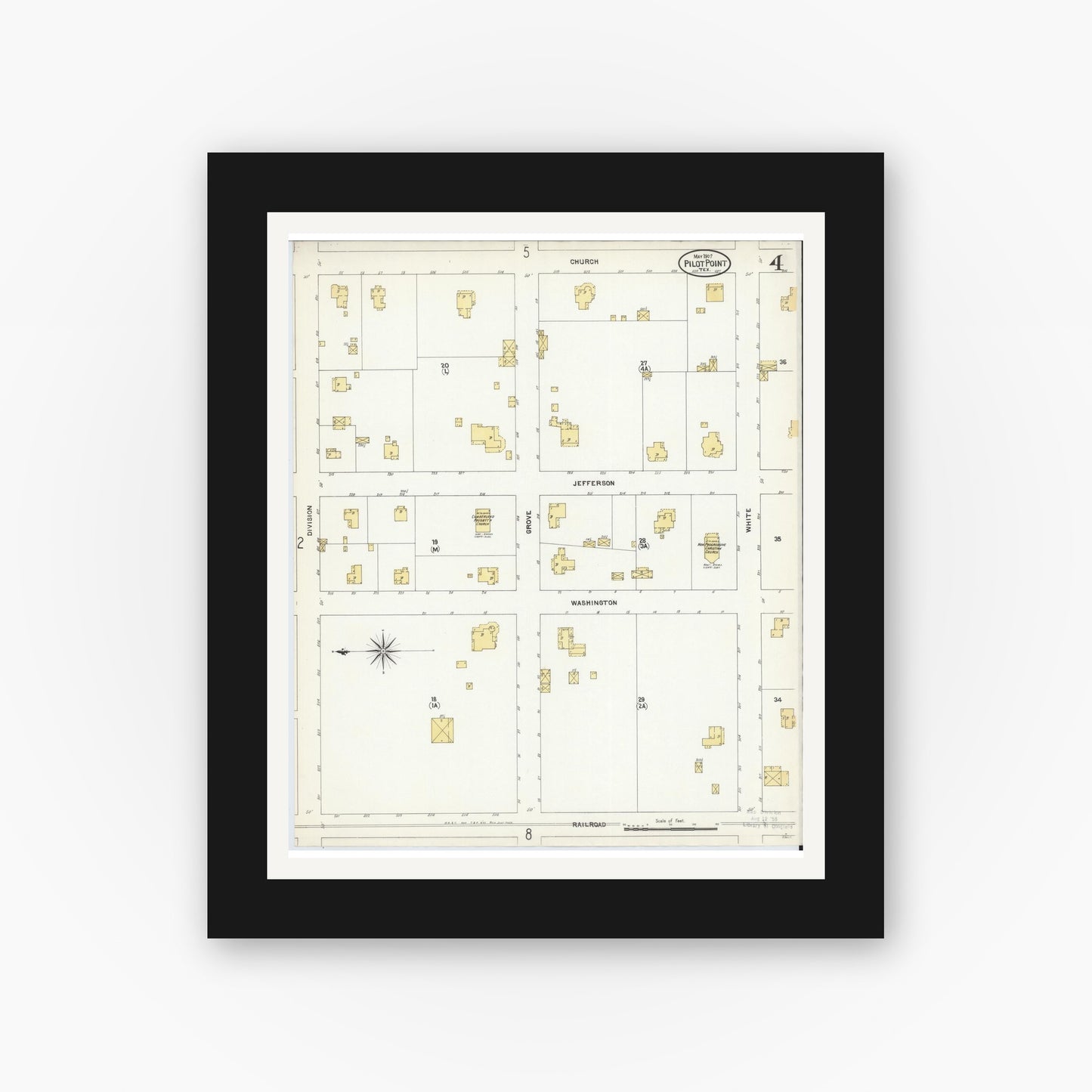 Old map wall art mockup — black gallery frame with white mat — Sanborn Fire Insurance Map from Pilot Point, Denton County, Texas (1907), Sheet #0004