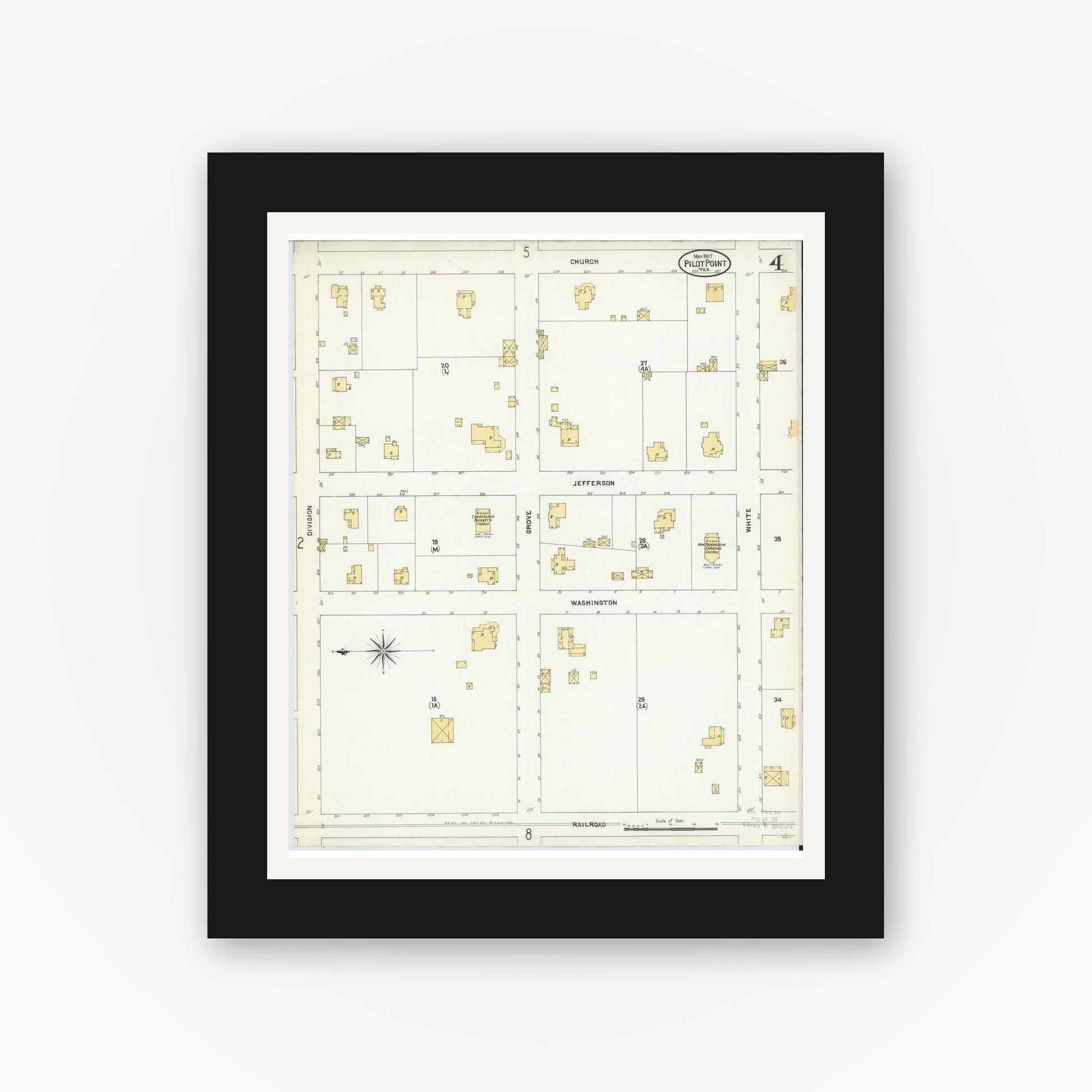 Old map wall art mockup — black gallery frame with white mat — Sanborn Fire Insurance Map from Pilot Point, Denton County, Texas (1907), Sheet #0004