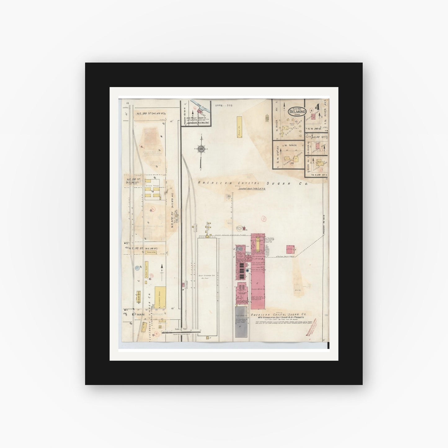 Old map wall art mockup — black gallery frame with white mat — Sanborn Fire Insurance Map from Belmond, Wright County, Iowa (1939), Sheet #0004