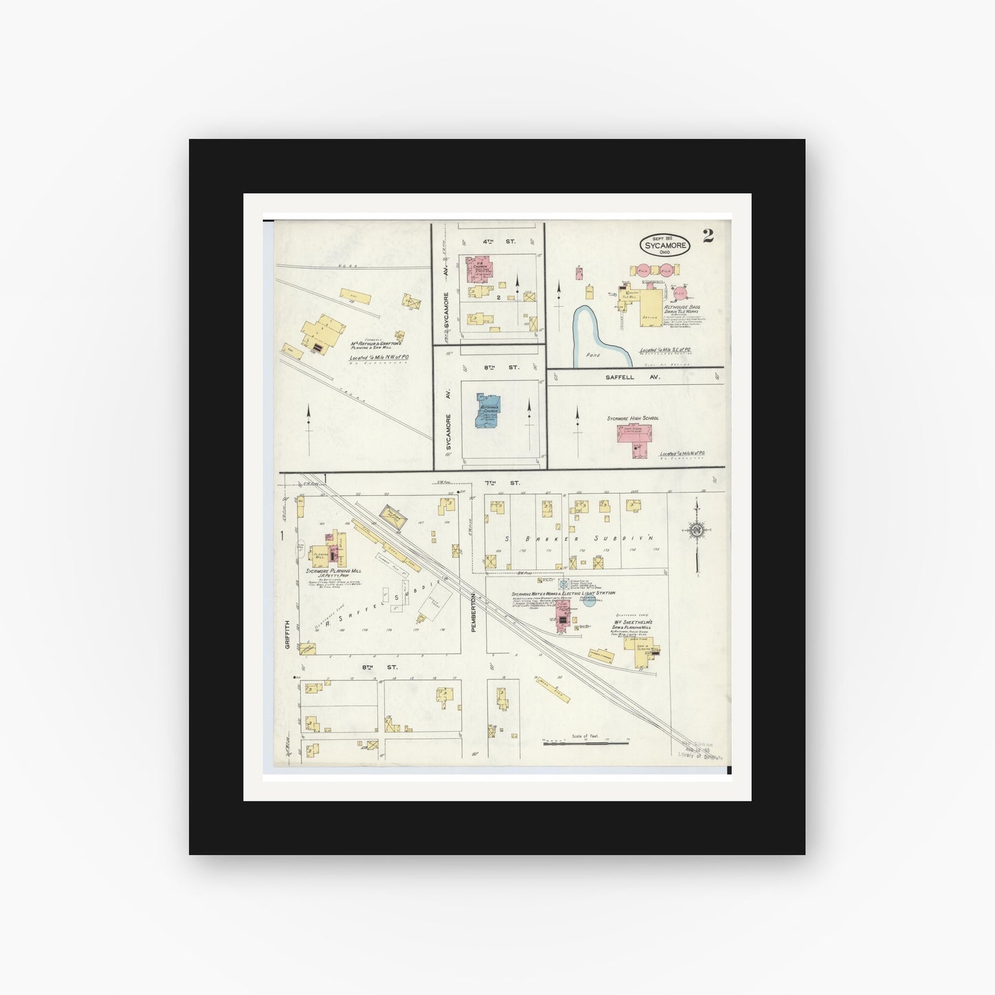 Old map wall art mockup — black gallery frame with white mat — Sanborn Fire Insurance Map from Sycamore, Wyandot County, Ohio (1911), Sheet #0002