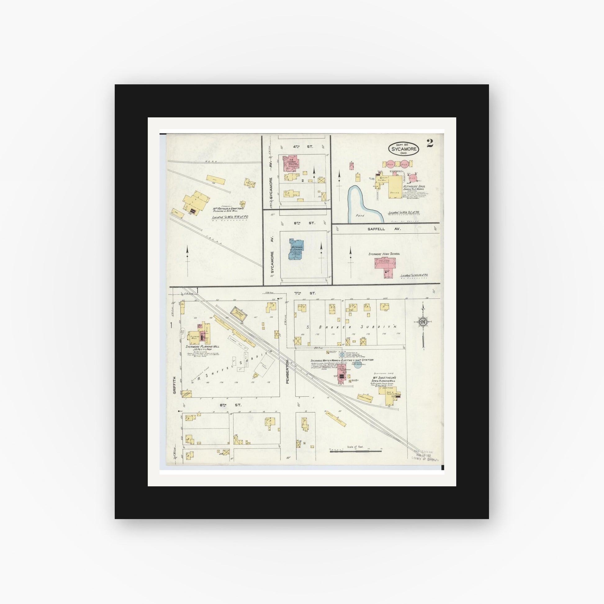 Old map wall art mockup — black gallery frame with white mat — Sanborn Fire Insurance Map from Sycamore, Wyandot County, Ohio (1911), Sheet #0002