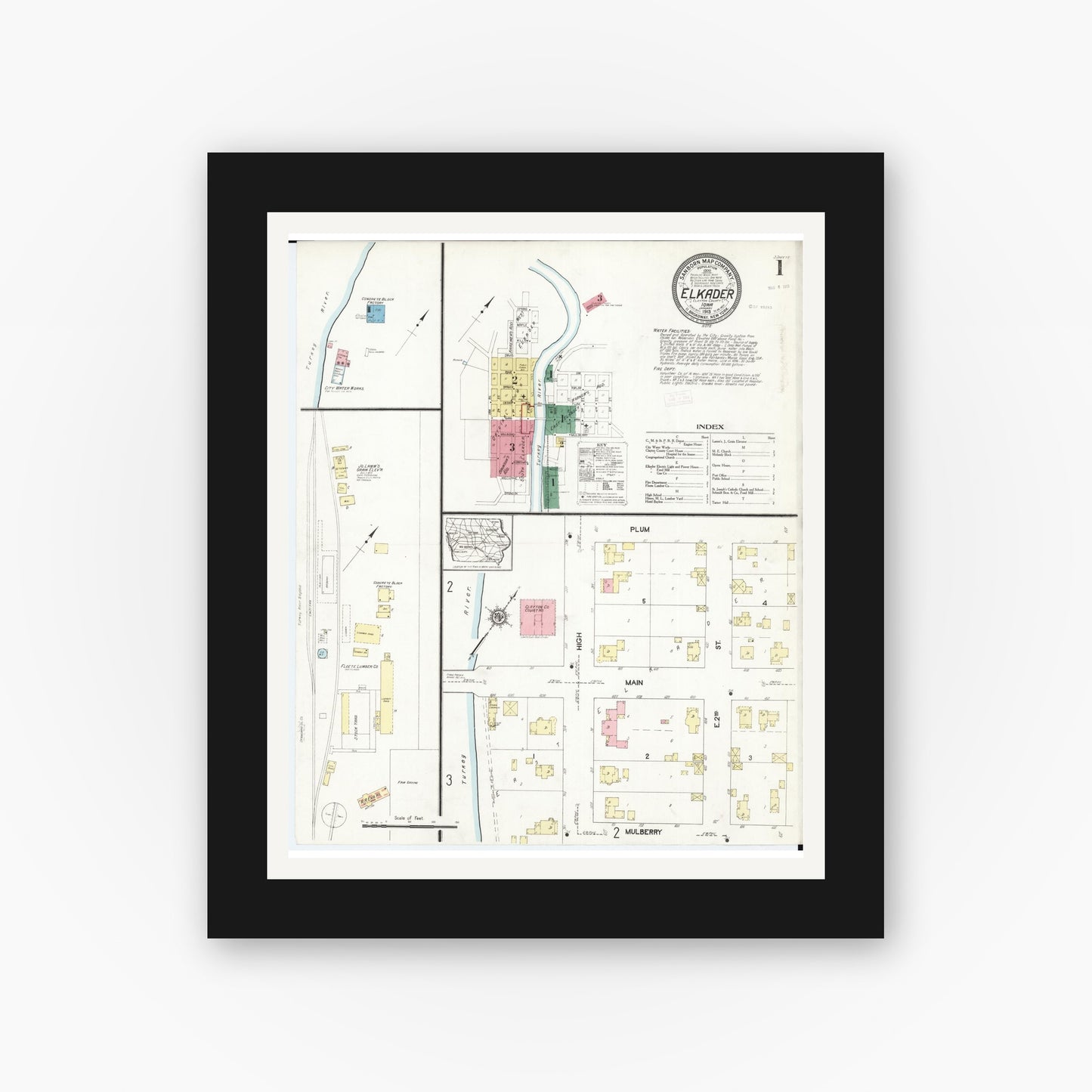 Old map wall art mockup — black gallery frame with white mat — Sanborn Fire Insurance Map from Elkader, Clayton County, Iowa (1913) â€” Complete Set