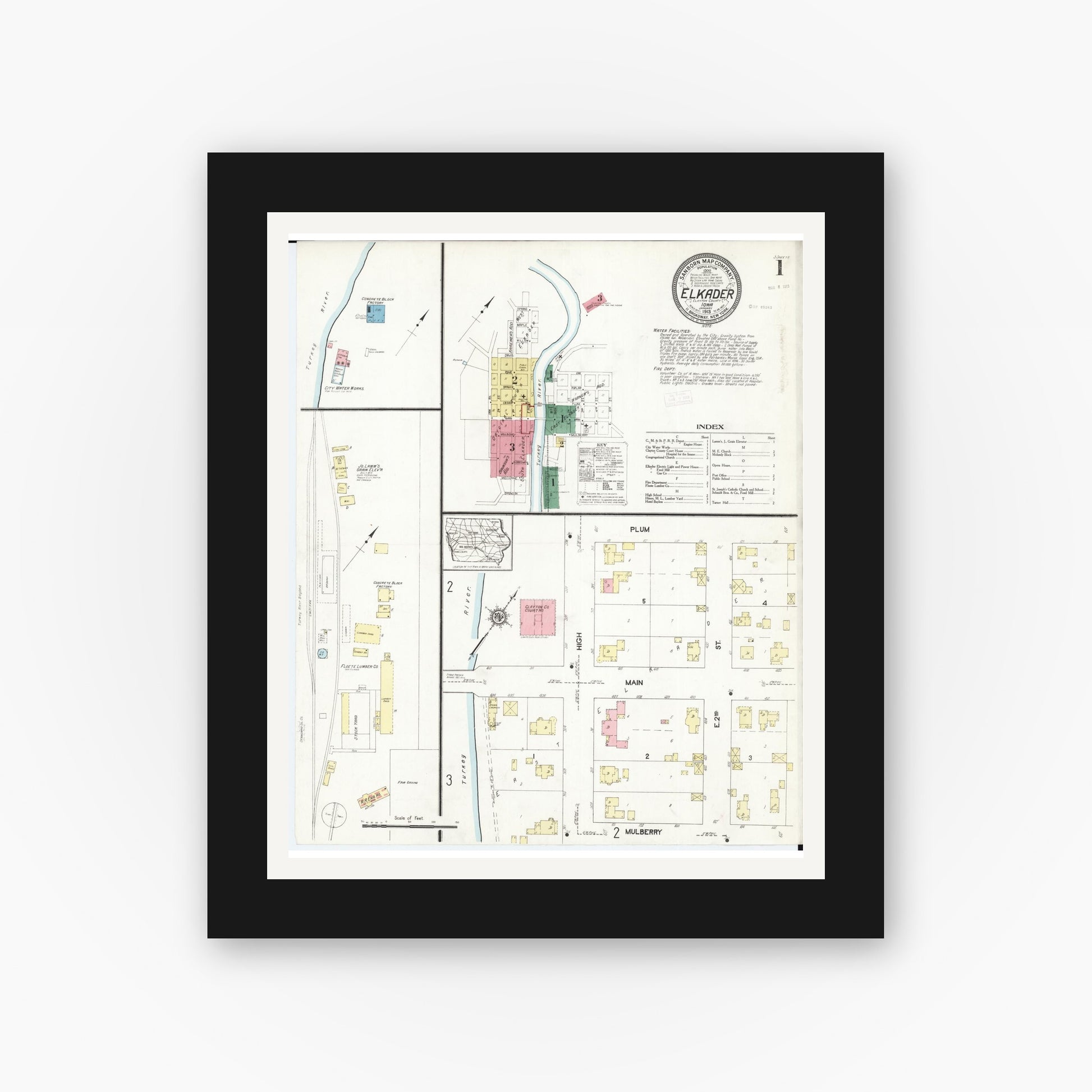 Old map wall art mockup — black gallery frame with white mat — Sanborn Fire Insurance Map from Elkader, Clayton County, Iowa (1913) â€” Complete Set