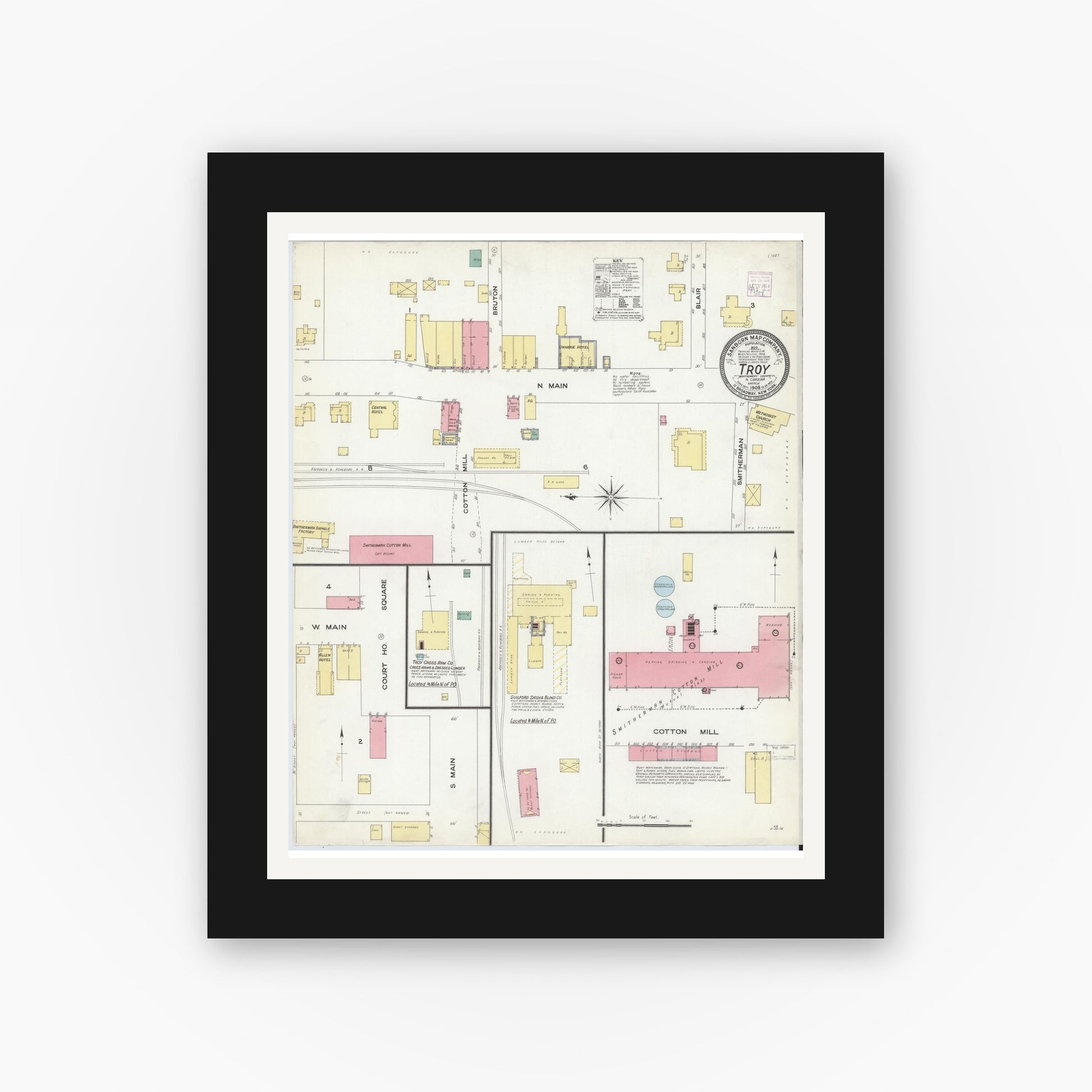 Old map wall art mockup — black gallery frame with white mat — Sanborn Fire Insurance Map from Troy, Montgomery County, North Carolina (1908), Sheet #0001
