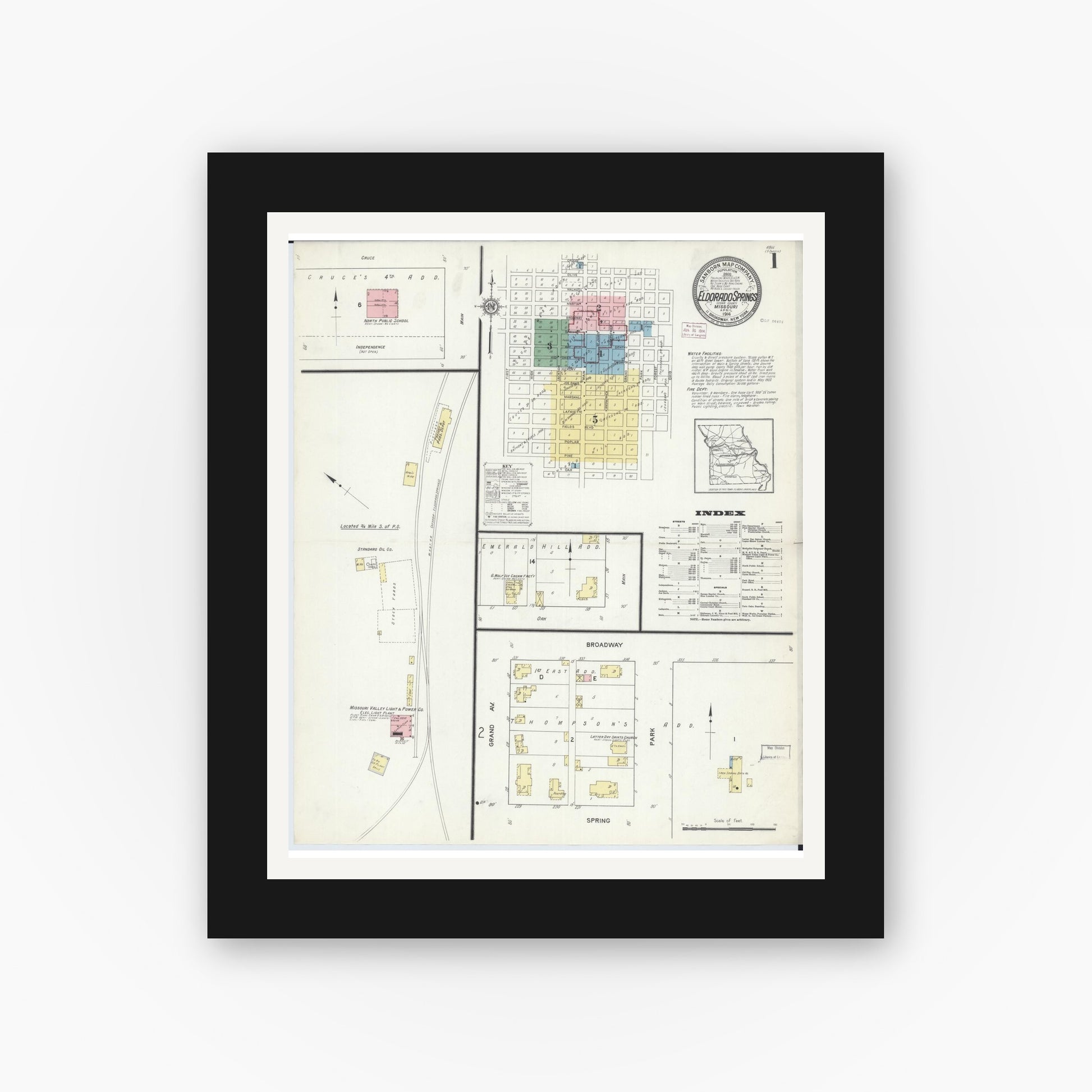 Old map wall art mockup — black gallery frame with white mat — Sanborn Fire Insurance Map from Eldorado Springs, Cedar County, Missouri (1914) - Complete Map Set