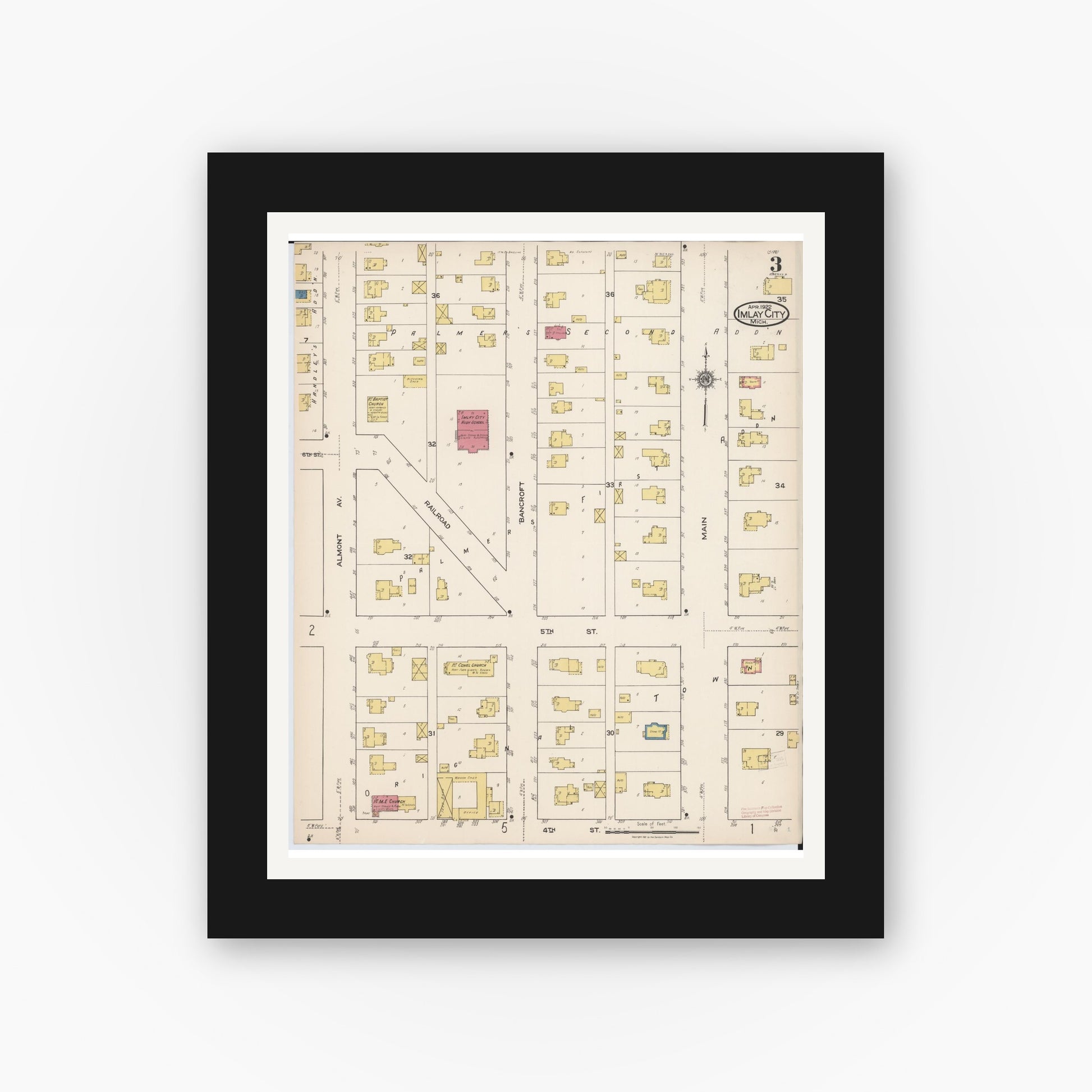Old map wall art mockup — black gallery frame with white mat — Sanborn Fire Insurance Map from Imlay City, Lapeer County, Michigan (1922), Sheet #0003
