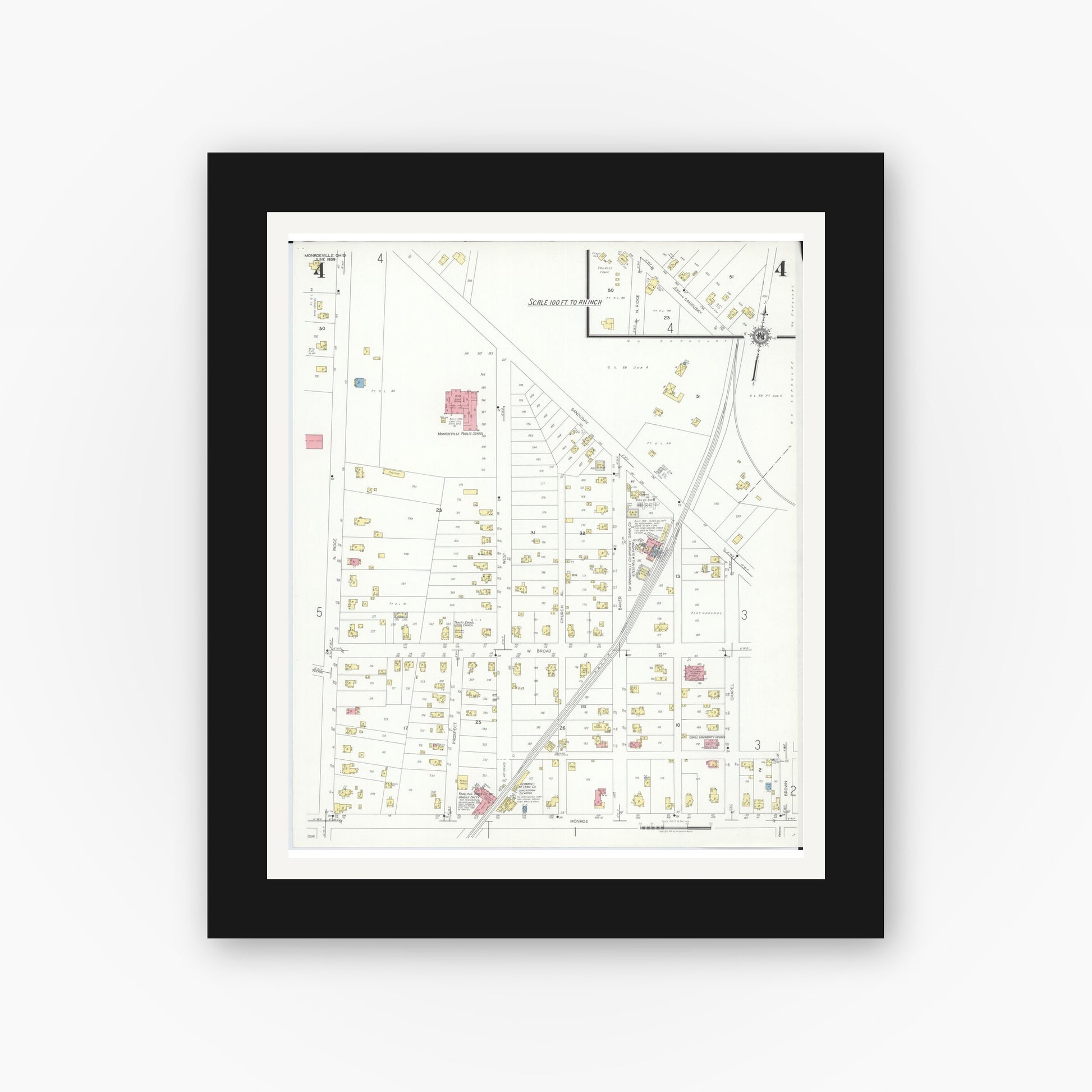 Old map wall art mockup — black gallery frame with white mat — Sanborn Fire Insurance Map from Monroeville, Huron County, Ohio (1939), Sheet #0004