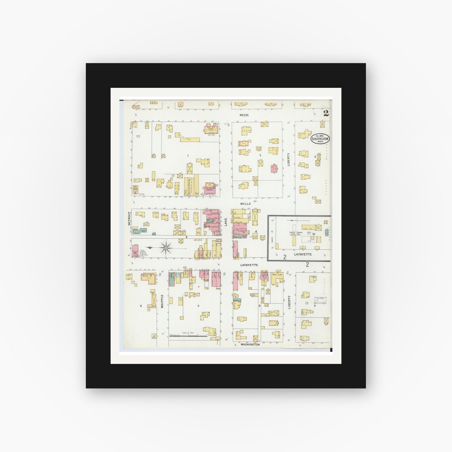 Old map wall art mockup — black gallery frame with white mat — Sanborn Fire Insurance Map from South Lyon, Oakland County, Michigan (1899), Sheet #0002