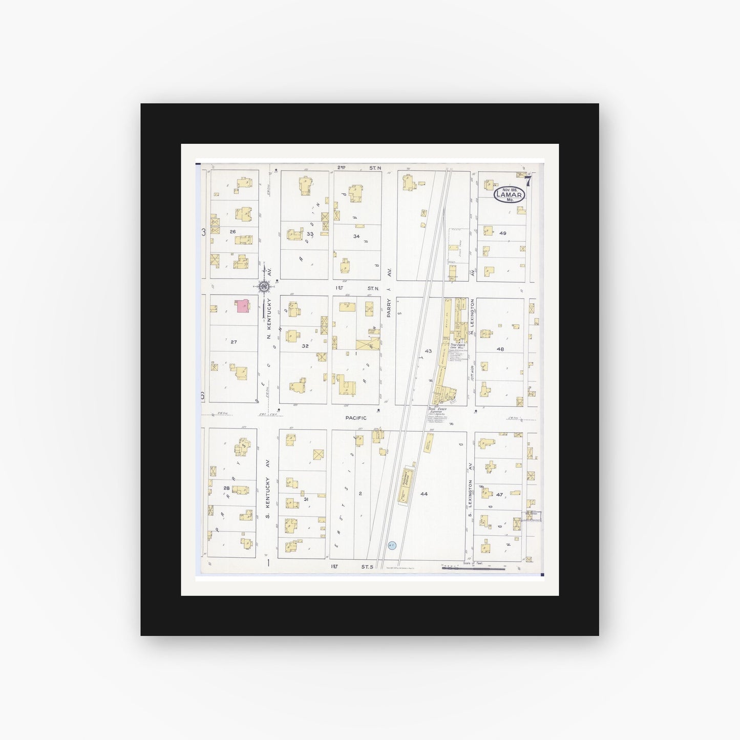 Old map wall art mockup — black gallery frame with white mat — Sanborn Fire Insurance Map from Lamar, Barton County, Missouri (1916), Sheet #0007