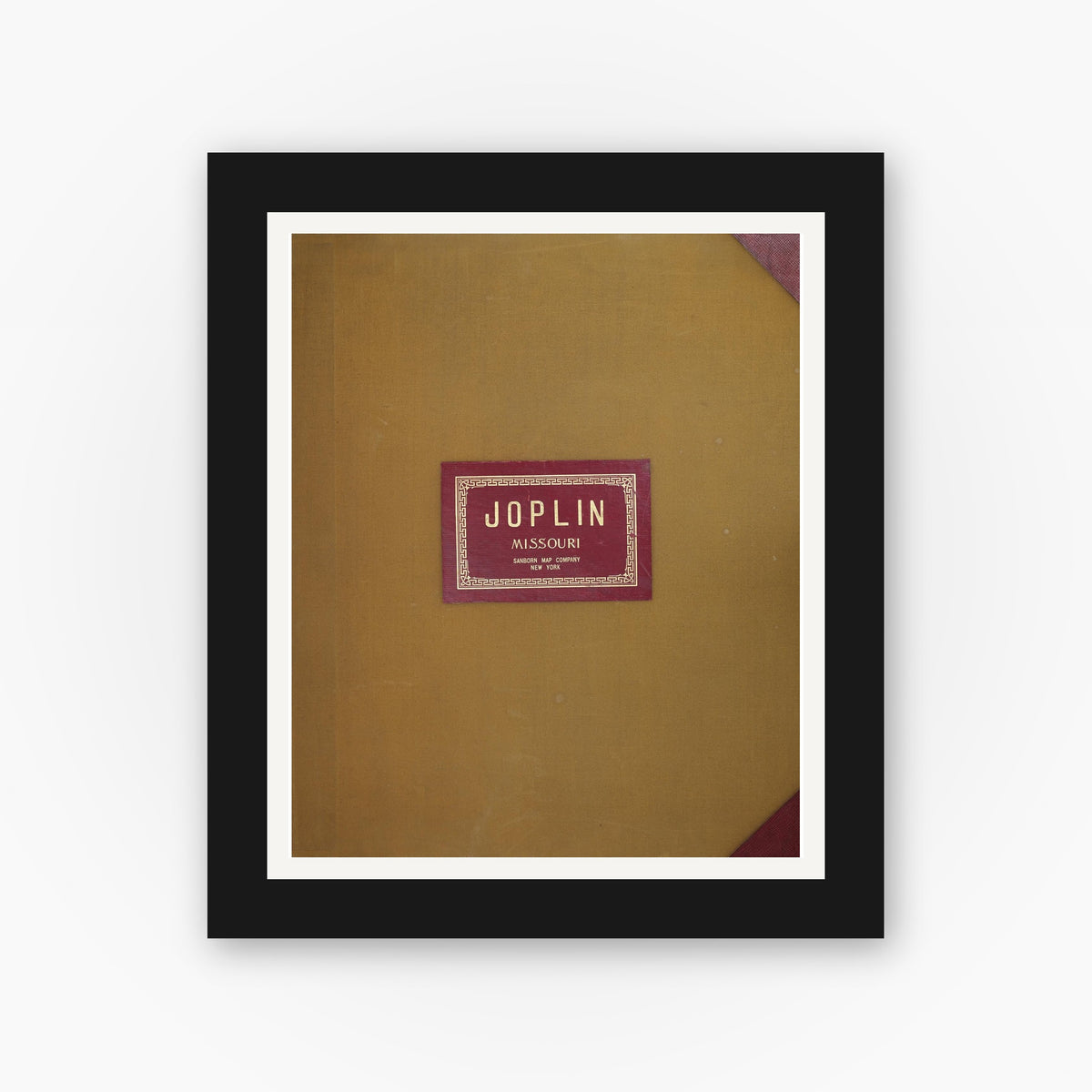 Old map wall art mockup — black gallery frame with white mat — Sanborn Fire Insurance Map from Joplin, Jasper County, Missouri (1950), Sheet #0001