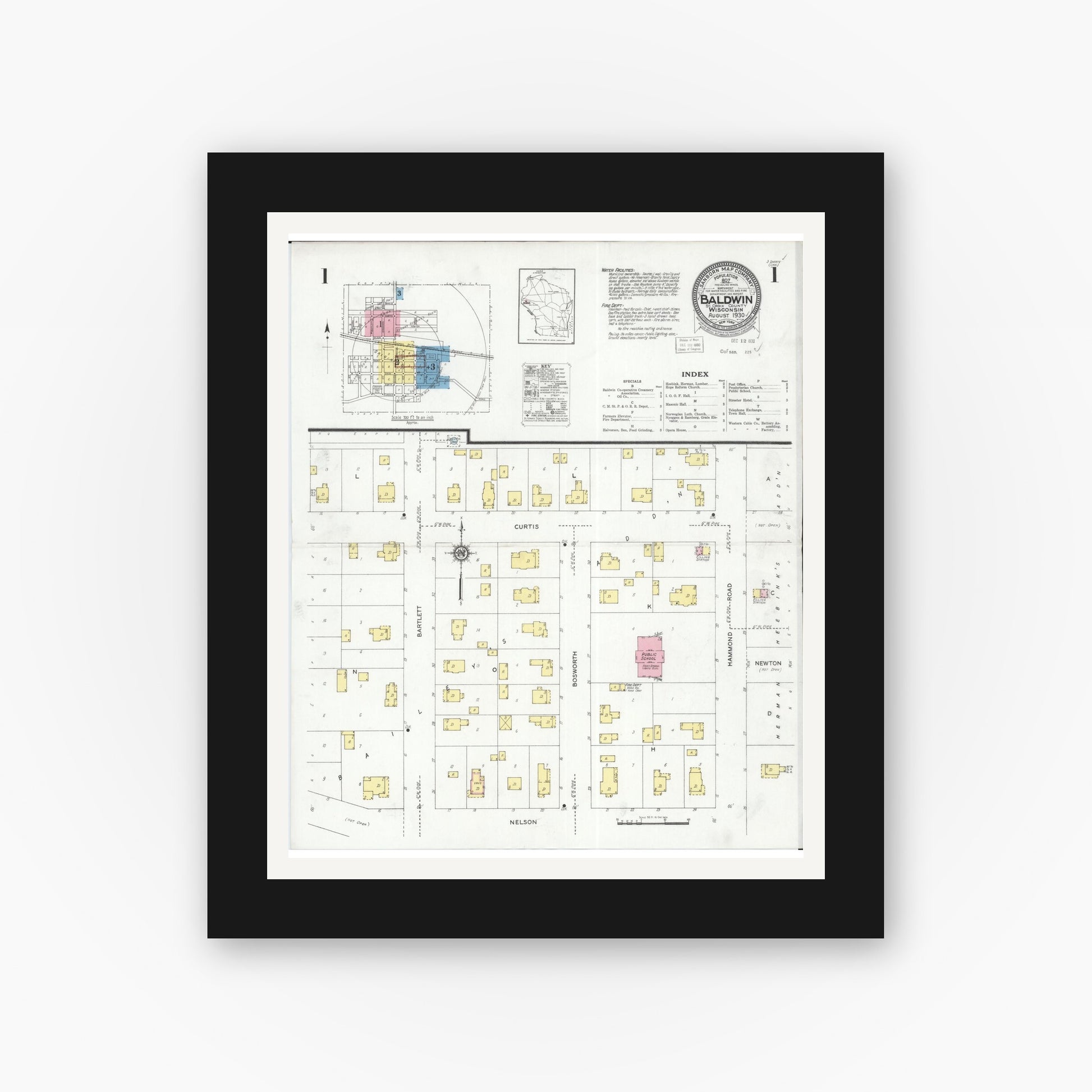 Old map wall art mockup — black gallery frame with white mat — Sanborn Fire Insurance Map from Baldwin, St. Croix County, Wisconsin (1930), Sheet #0001