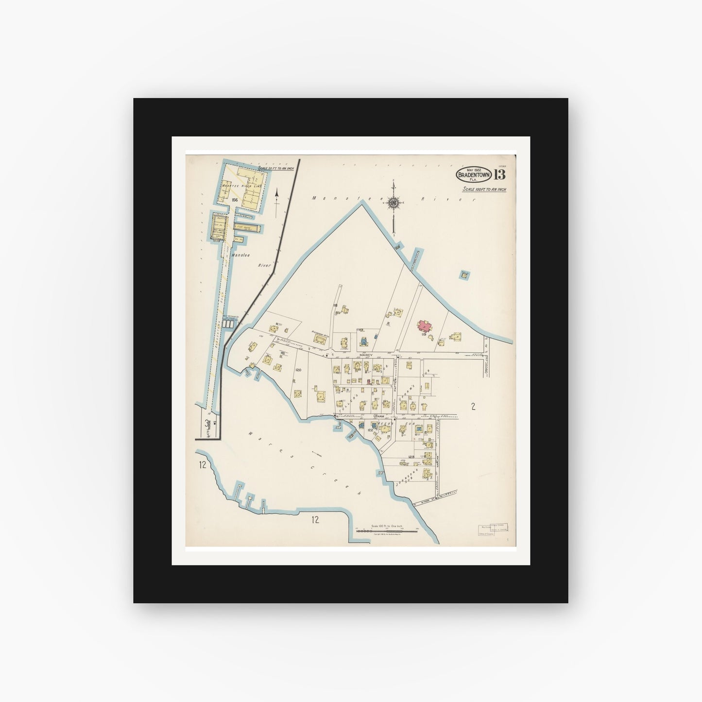 Old map wall art mockup — black gallery frame with white mat — Sanborn Fire Insurance Map from Bradentown, Manatee County, Florida (1922), Sheet #0013