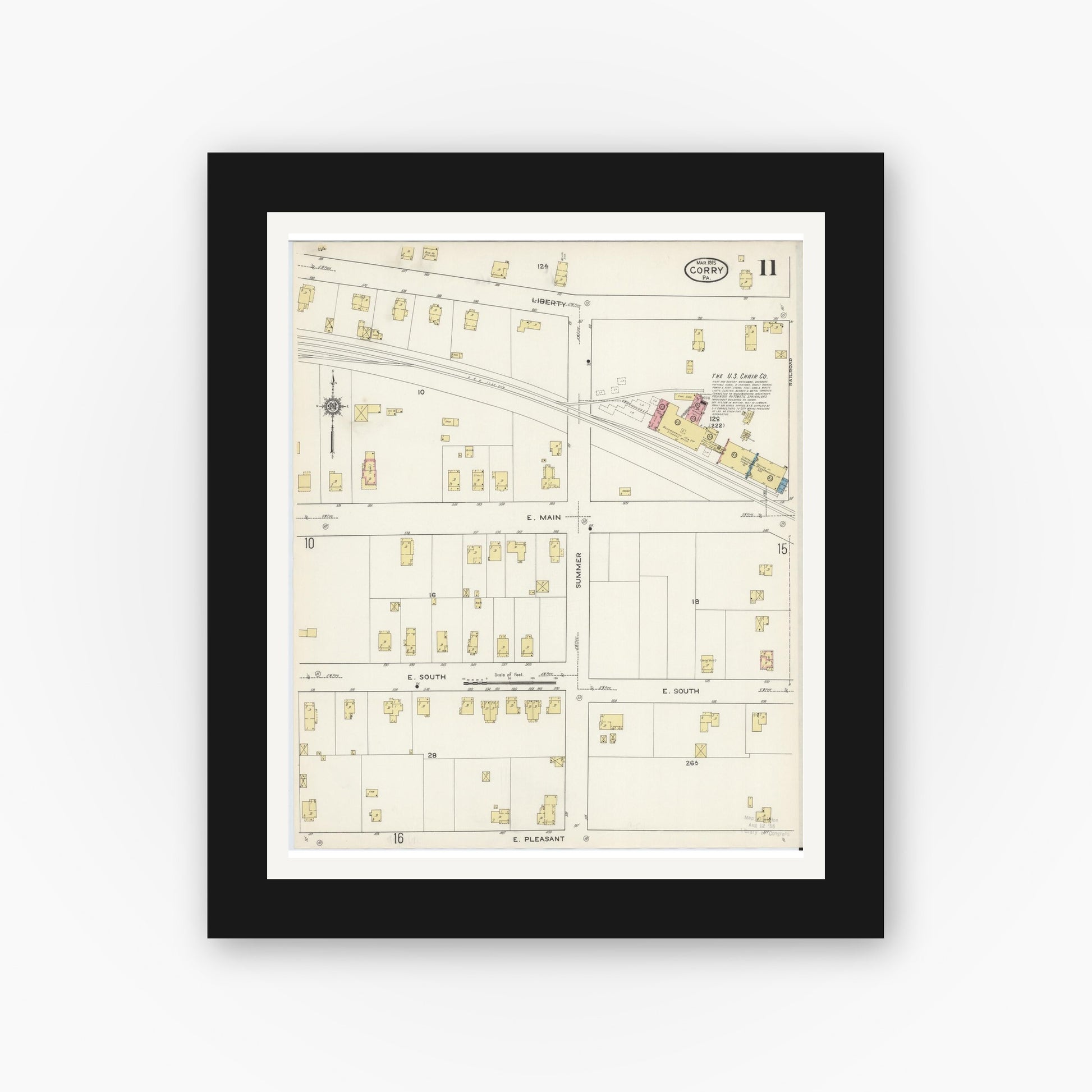 Old map wall art mockup — black gallery frame with white mat — Sanborn Fire Insurance Map from Corry, Erie County, Pennsylvania (1915), Sheet #0011