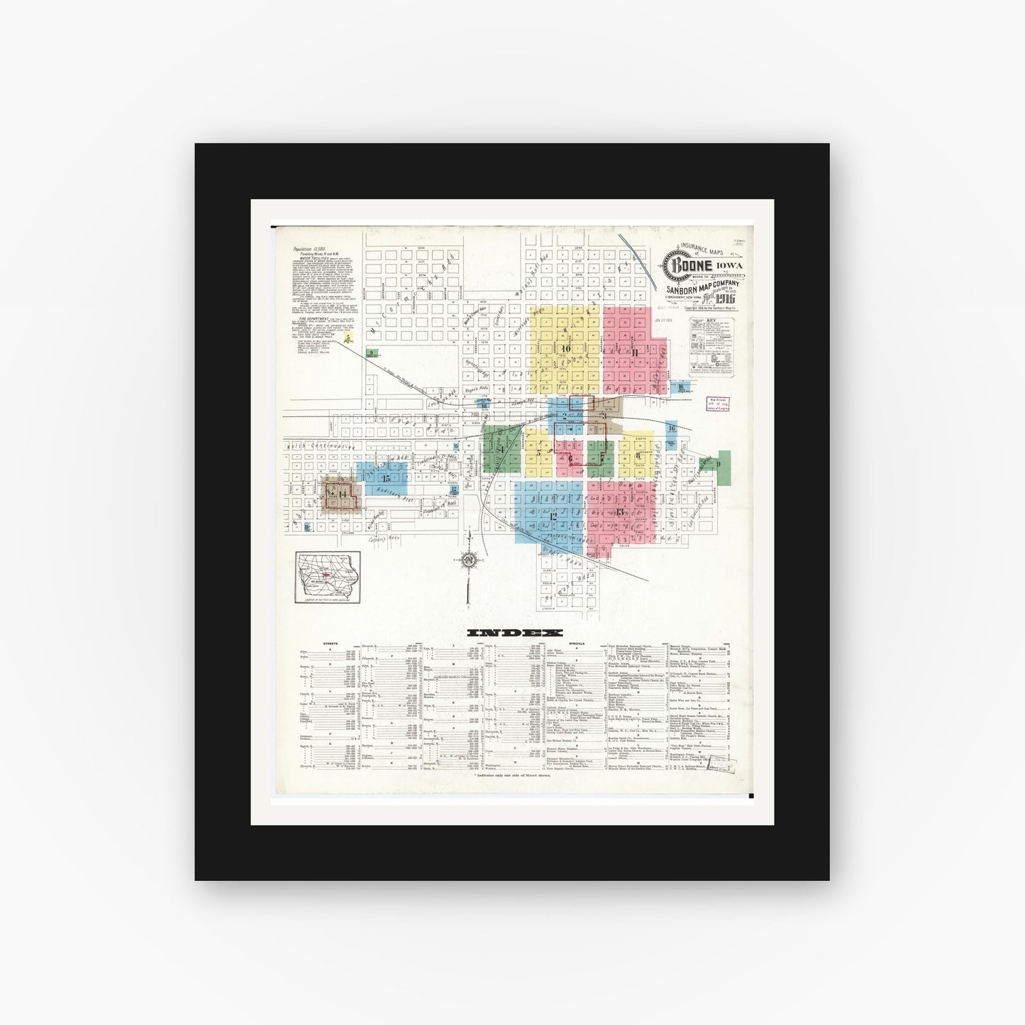 Old map wall art mockup — black gallery frame with white mat — Sanborn Fire Insurance Map from Boone, Boone County, Iowa (1916) â€” Complete Set