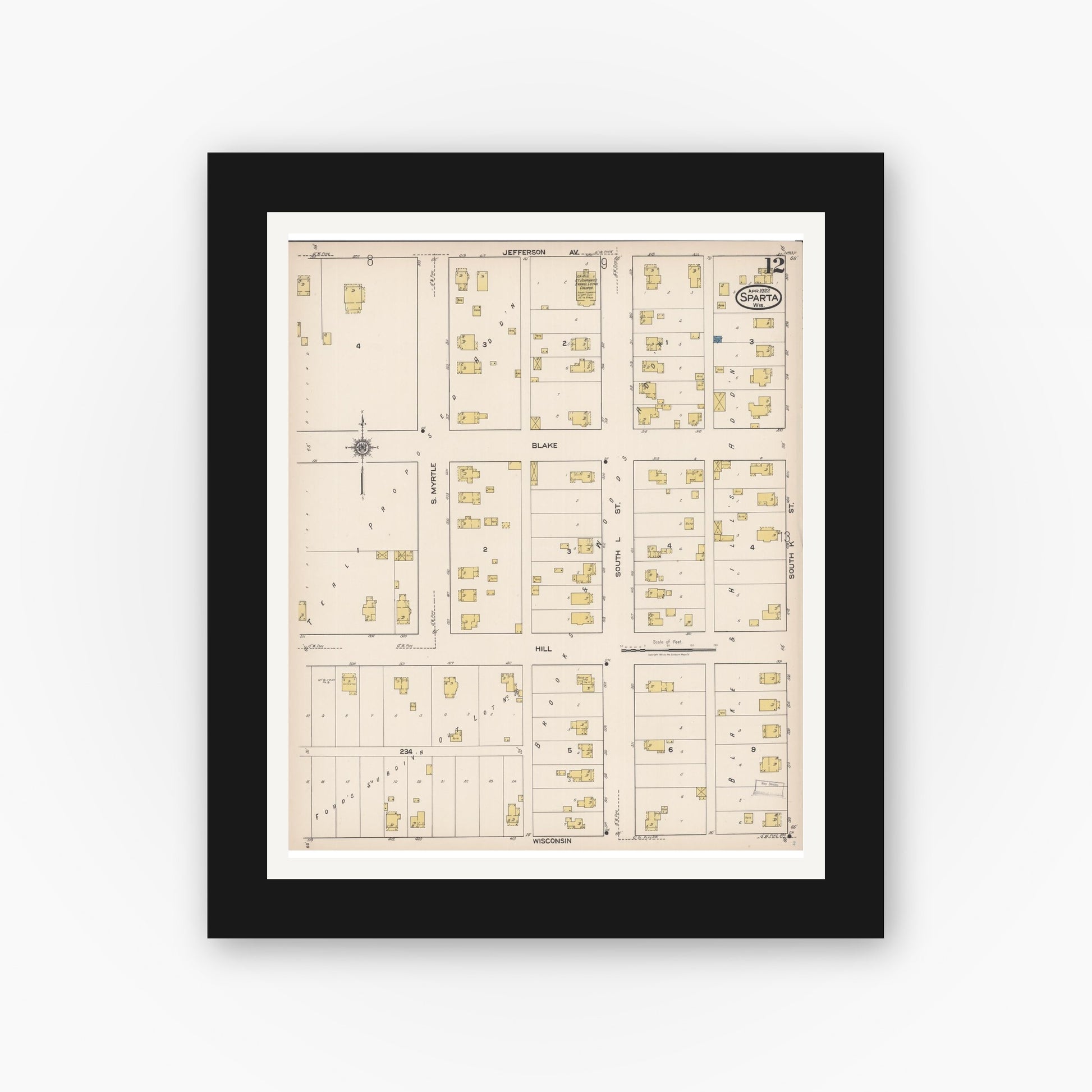 Old map wall art mockup — black gallery frame with white mat — Sanborn Fire Insurance Map from Sparta, Monroe County, Wisconsin (1922), Sheet #0012