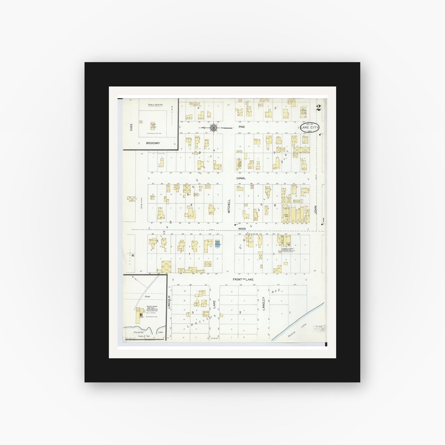 Old map wall art mockup — black gallery frame with white mat — Sanborn Fire Insurance Map from Lake City, Missaukee County, Michigan (1910), Sheet #0002