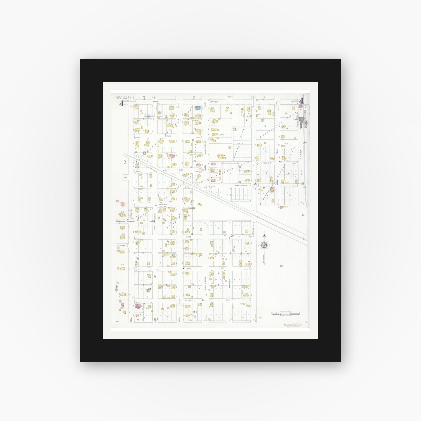 Old map wall art mockup — black gallery frame with white mat — Sanborn Fire Insurance Map from Sullivan, Moultrie County, Illinois (1932), Sheet #0004