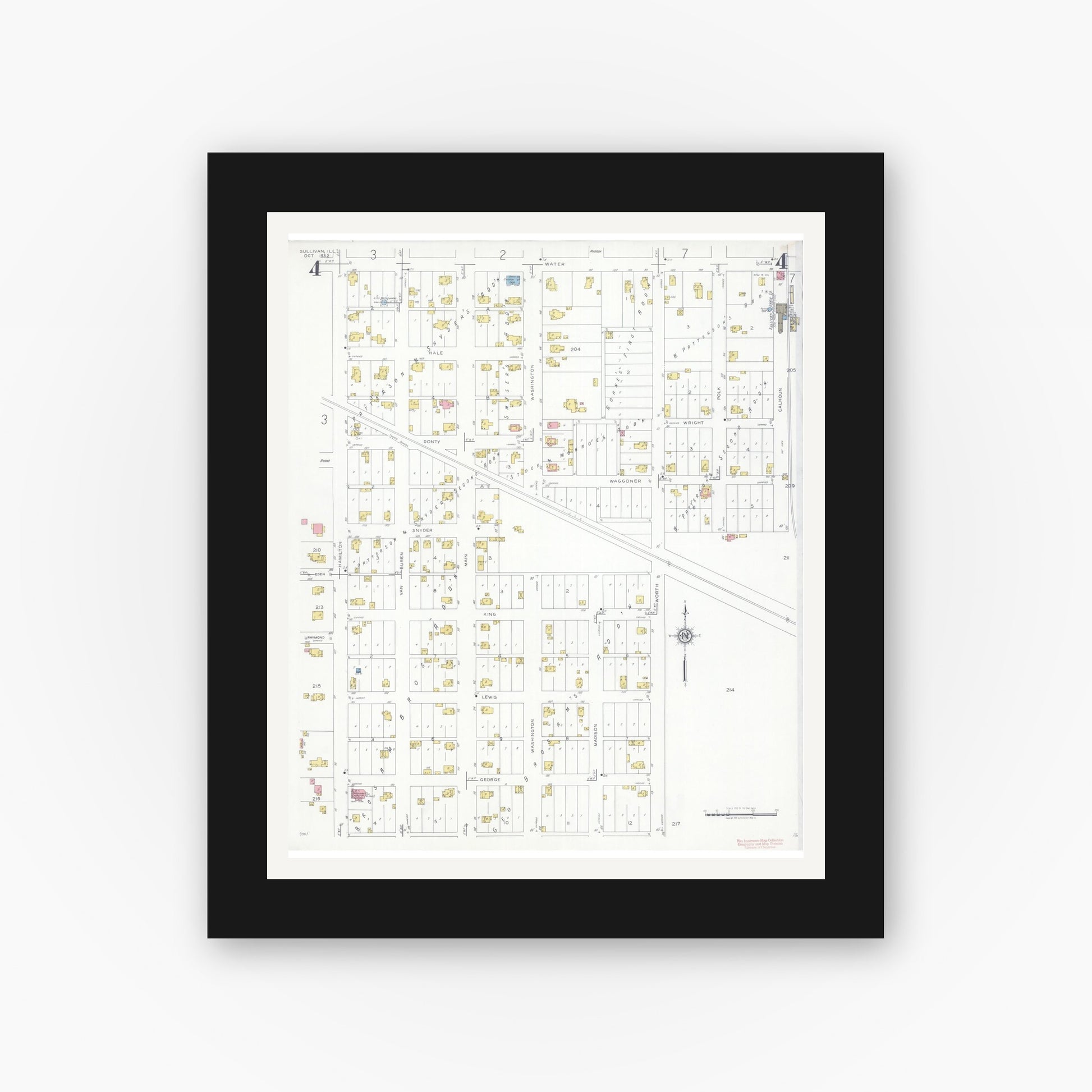Old map wall art mockup — black gallery frame with white mat — Sanborn Fire Insurance Map from Sullivan, Moultrie County, Illinois (1932), Sheet #0004