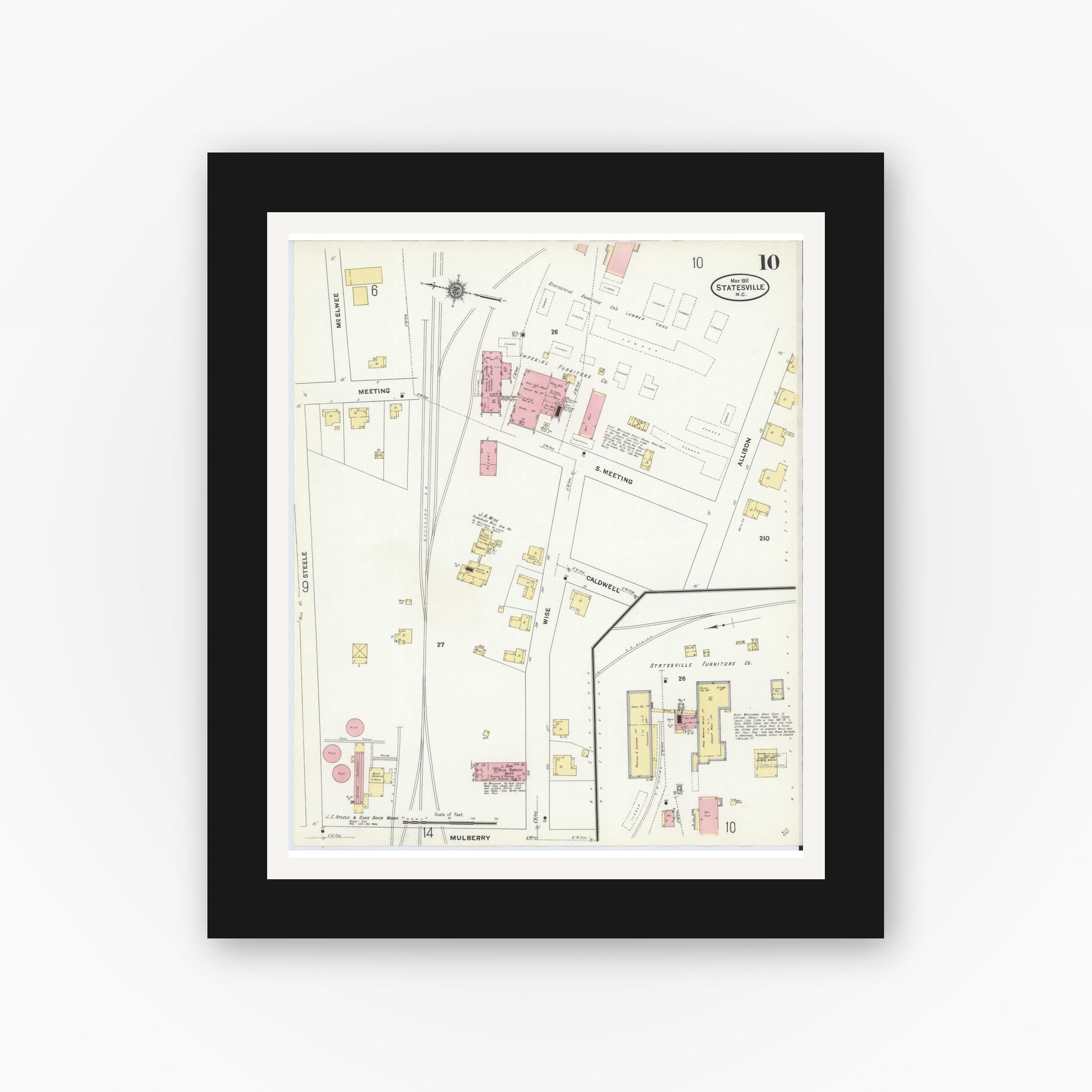 Old map wall art mockup — black gallery frame with white mat — Sanborn Fire Insurance Map from Statesville, Iredell County, North Carolina (1911), Sheet #0010