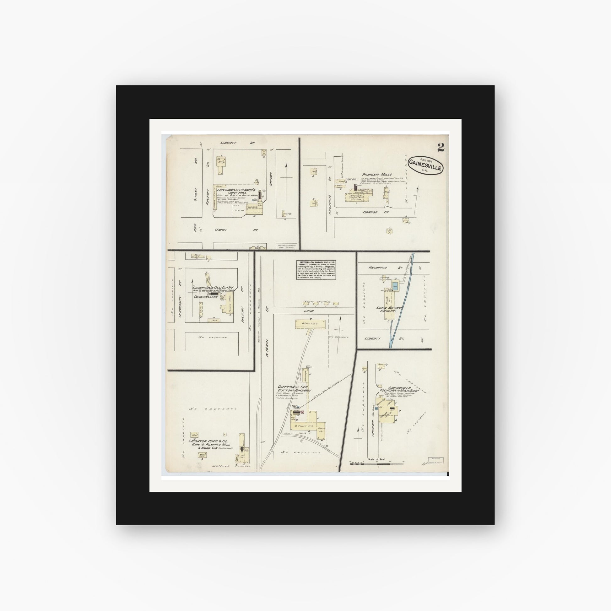 Old map wall art mockup — black gallery frame with white mat — Sanborn Fire Insurance Map from Gainesville, Alachua County, Florida (1884), Sheet #0002