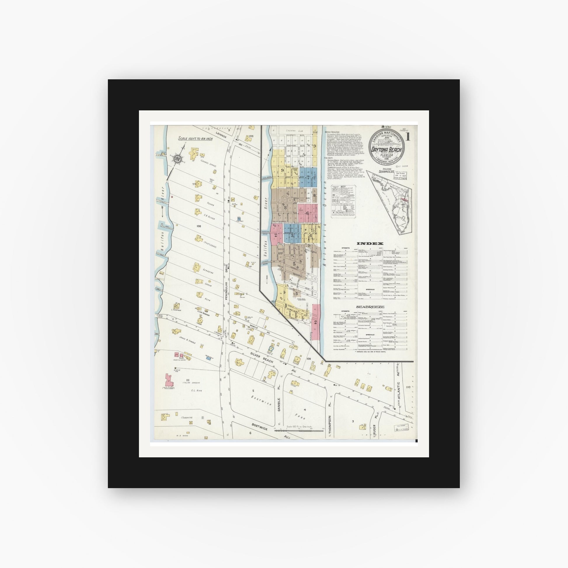 Old map wall art mockup — black gallery frame with white mat — Sanborn Fire Insurance Map from Daytona Beach, Volusia County, Florida (1916), Sheet #0001