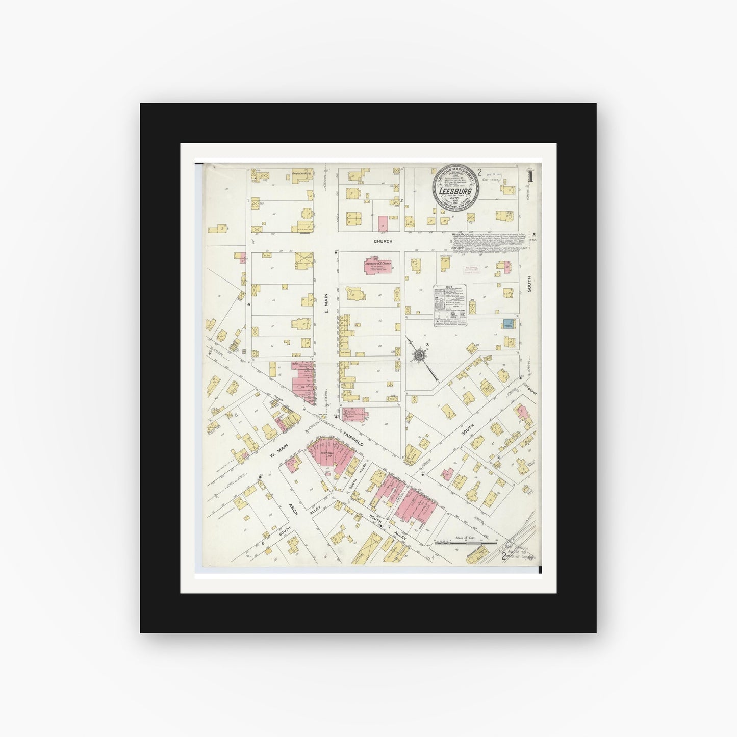 Old map wall art mockup — black gallery frame with white mat — Sanborn Fire Insurance Map from Leesburg, Highland County, Ohio (1911), Sheet #0001