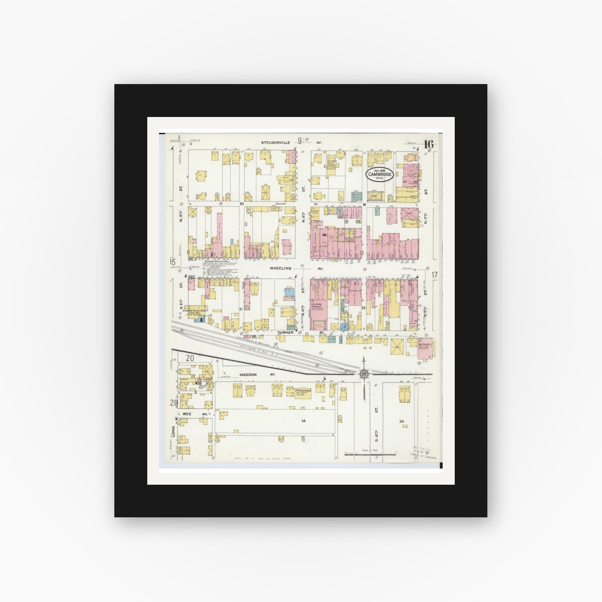 Old map wall art mockup — black gallery frame with white mat — Sanborn Fire Insurance Map from Cambridge, Guernsey County, Ohio (1909), Sheet #0016