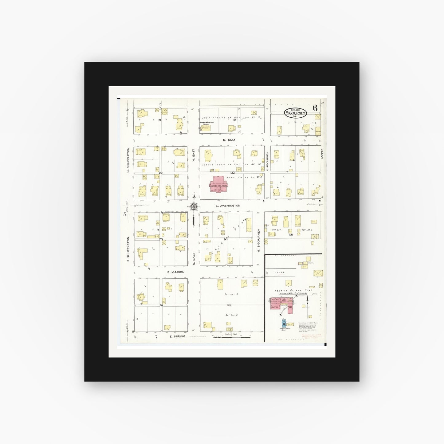 Old map wall art mockup — black gallery frame with white mat — Sanborn Fire Insurance Map from Sigourney, Kiokuk County, Iowa (1916), Sheet #0006