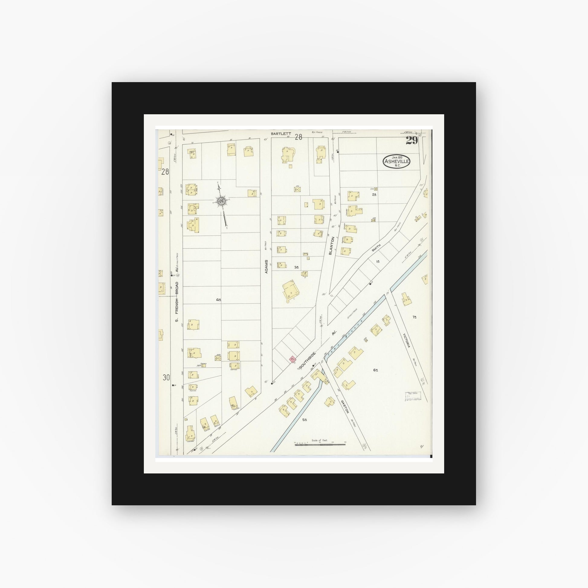 Old map wall art mockup — black gallery frame with white mat — Sanborn Fire Insurance Map from Asheville, Buncombe County, North Carolina (1913), Sheet #0029