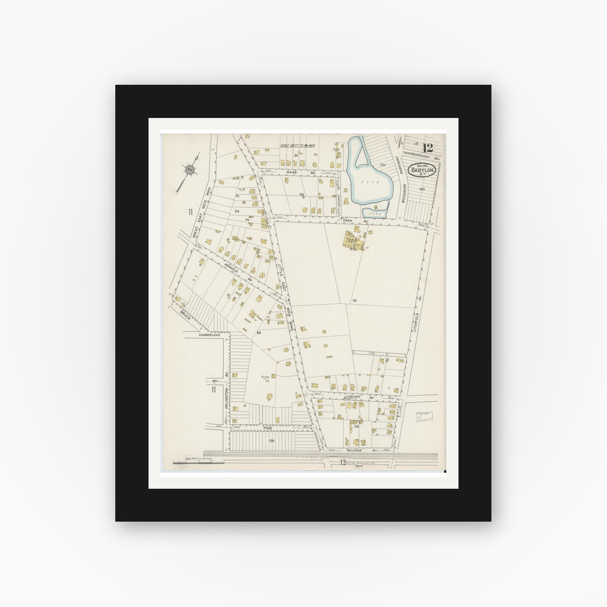 Old map wall art mockup — black gallery frame with white mat — Sanborn Fire Insurance Map from Babylon, Suffolk County, New York (1915), Sheet #0012