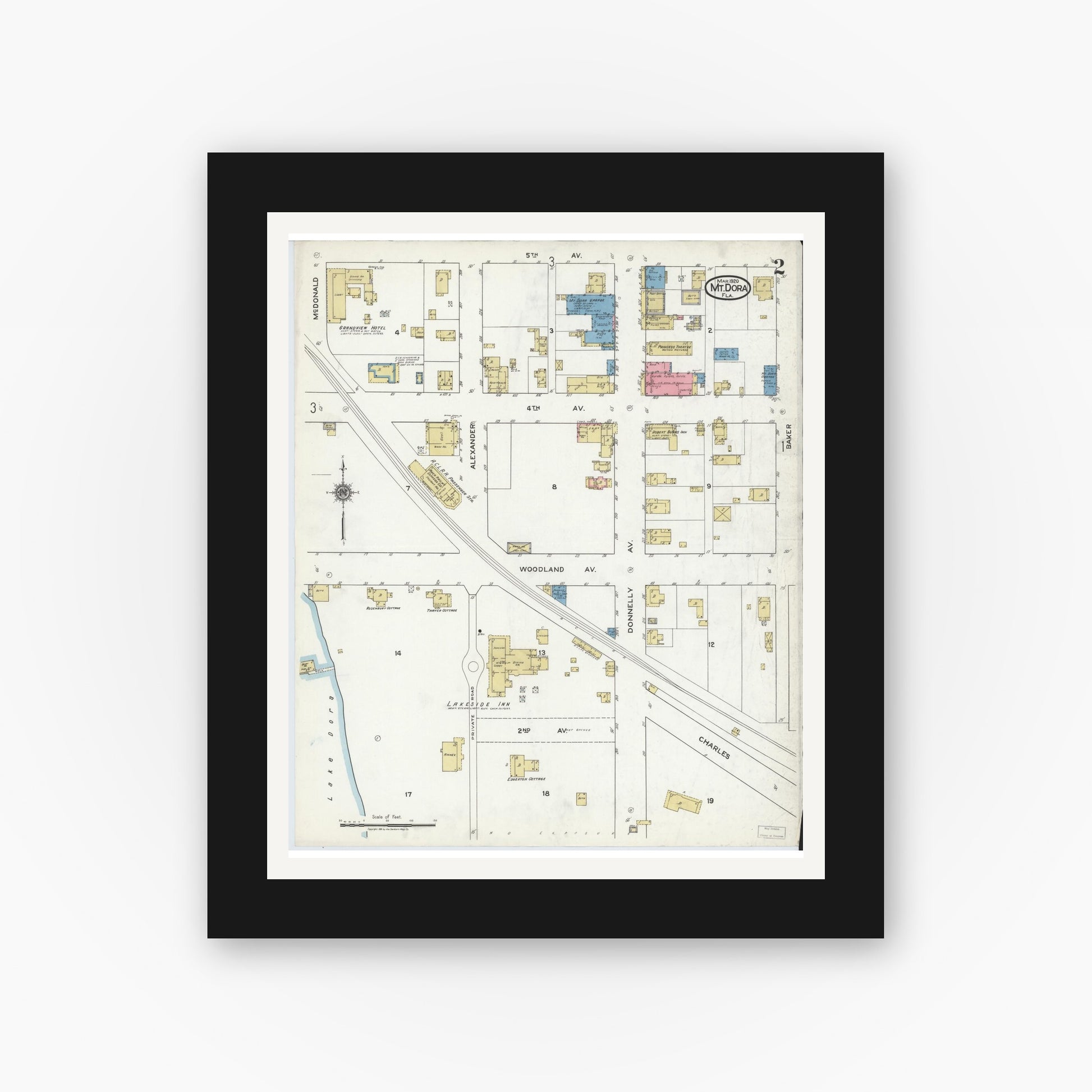 Old map wall art mockup — black gallery frame with white mat — Sanborn Fire Insurance Map from Mount Dora, Lake County, Florida (1920), Sheet #0002