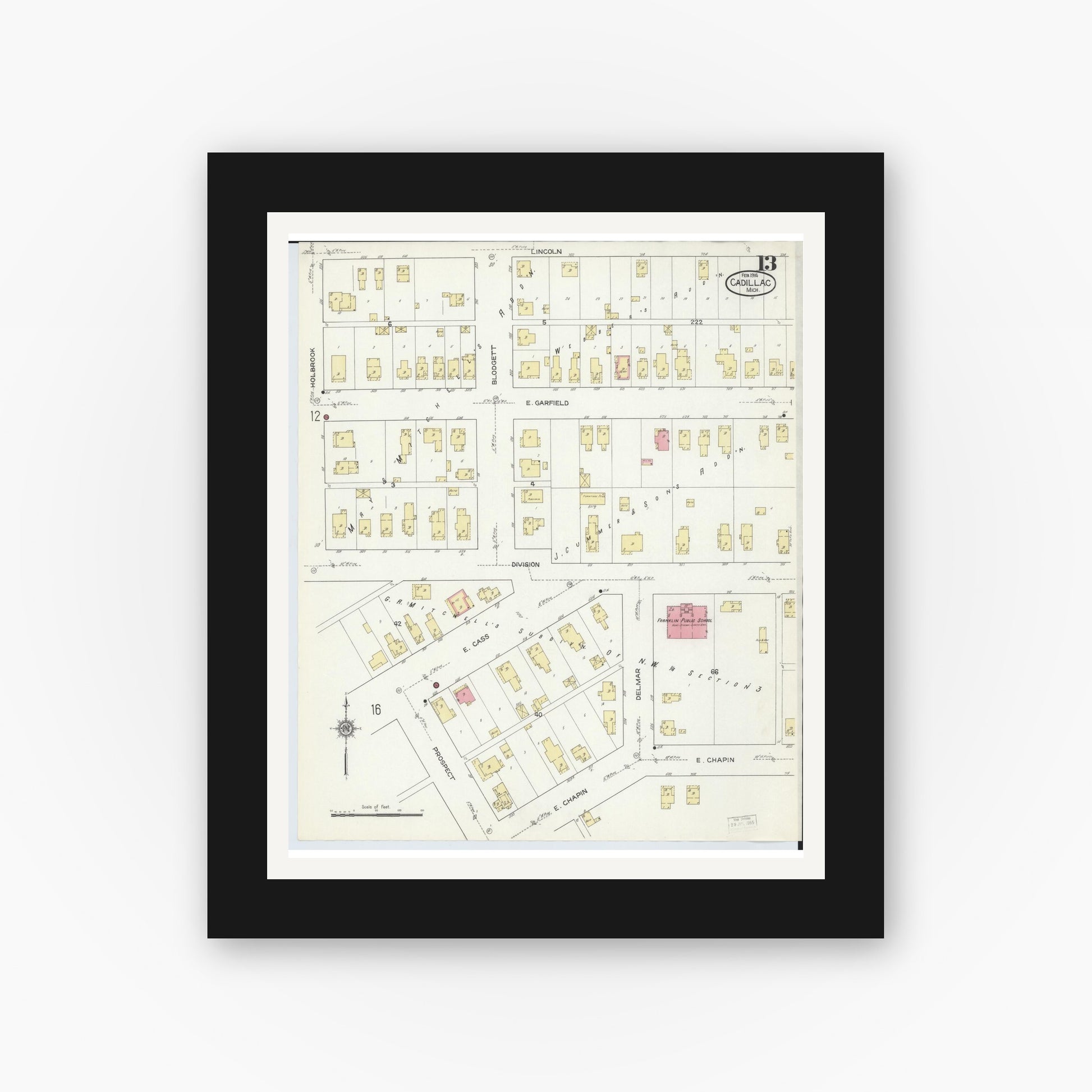 Old map wall art mockup — black gallery frame with white mat — Sanborn Fire Insurance Map from Cadillac, Wexford County, Michigan (1914), Sheet #0013