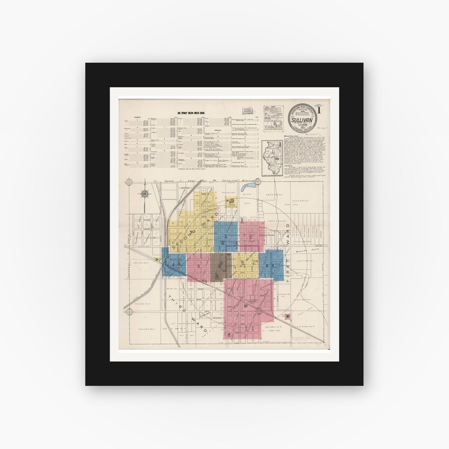 Old map wall art mockup — black gallery frame with white mat — Sanborn Fire Insurance Map from Sullivan, Moultrie County, Illinois (1922), Sheet #0001
