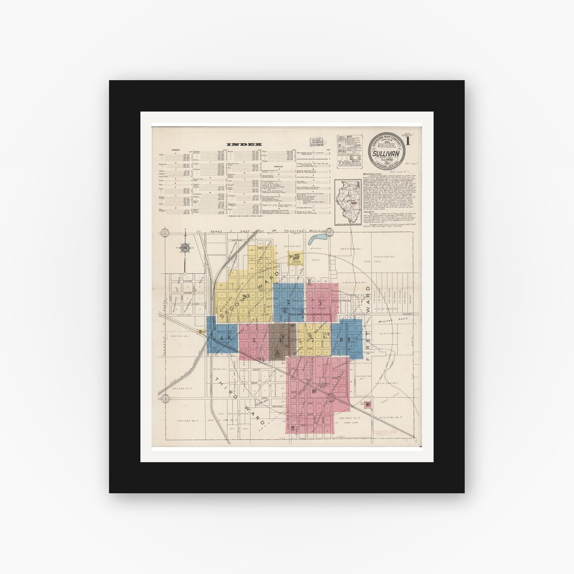 Old map wall art mockup — black gallery frame with white mat — Sanborn Fire Insurance Map from Sullivan, Moultrie County, Illinois (1922), Sheet #0001