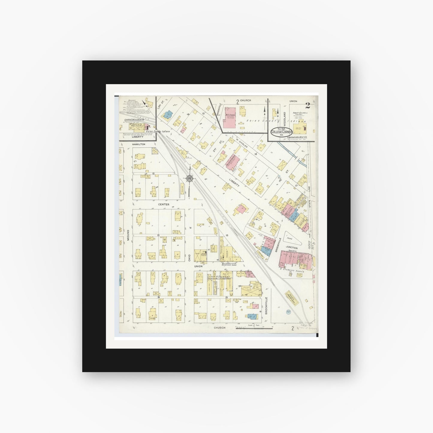 Old map wall art mockup — black gallery frame with white mat — Sanborn Fire Insurance Map from College Corner, Preble And Butler, Ohio (1914), Sheet #0002
