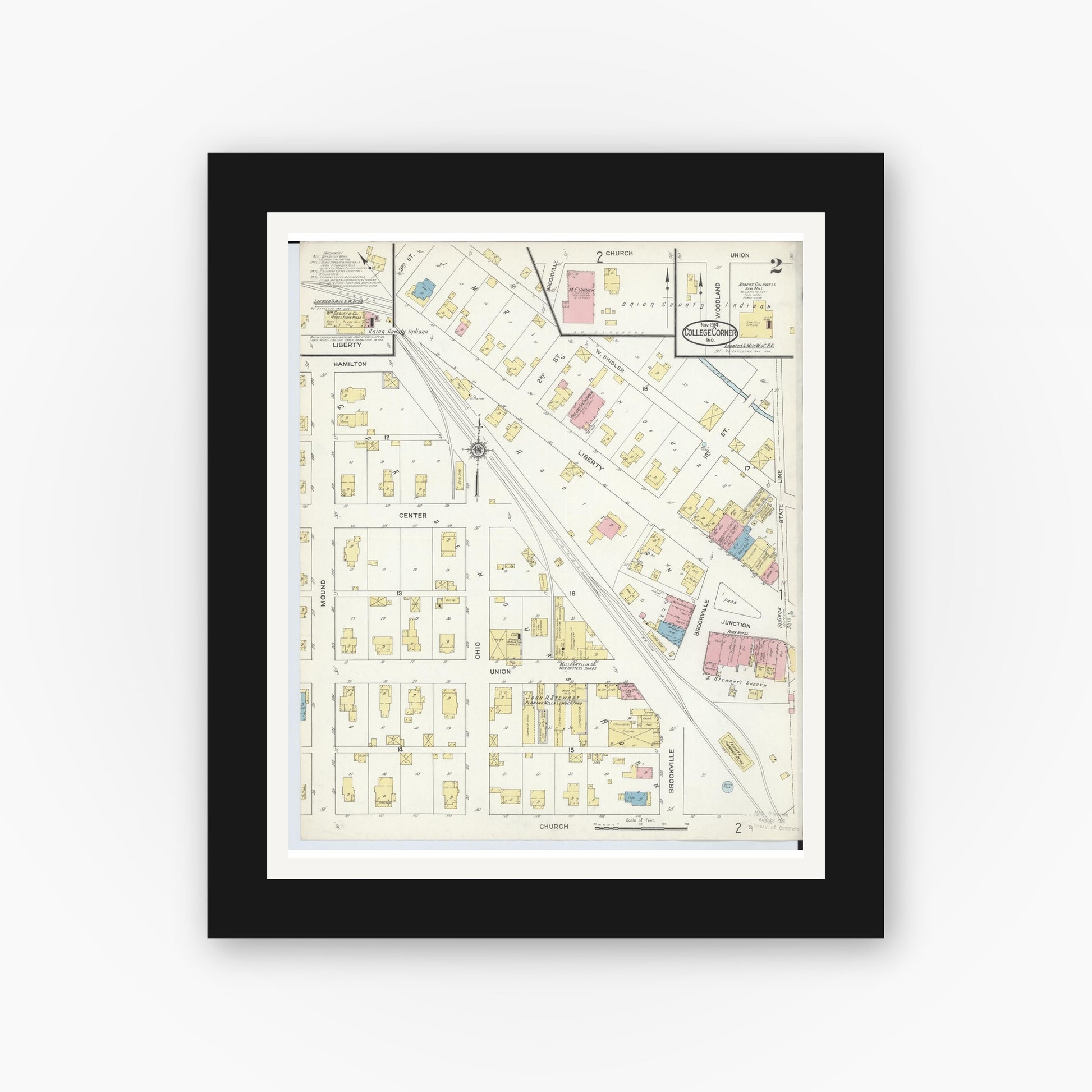 Old map wall art mockup — black gallery frame with white mat — Sanborn Fire Insurance Map from College Corner, Preble And Butler, Ohio (1914), Sheet #0002