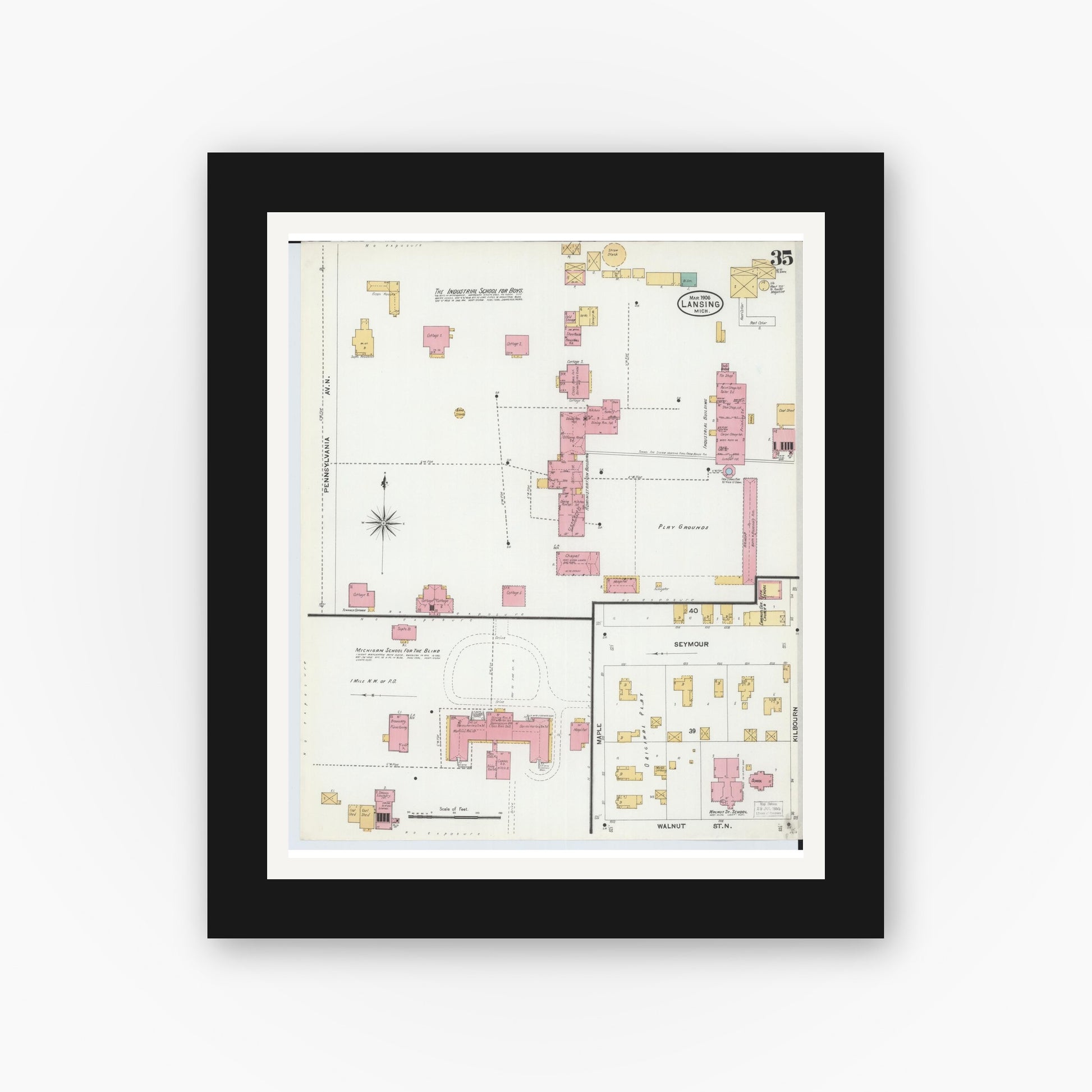 Old map wall art mockup — black gallery frame with white mat — Sanborn Fire Insurance Map from Lansing, Ingham County, Michigan (1906), Sheet #0035