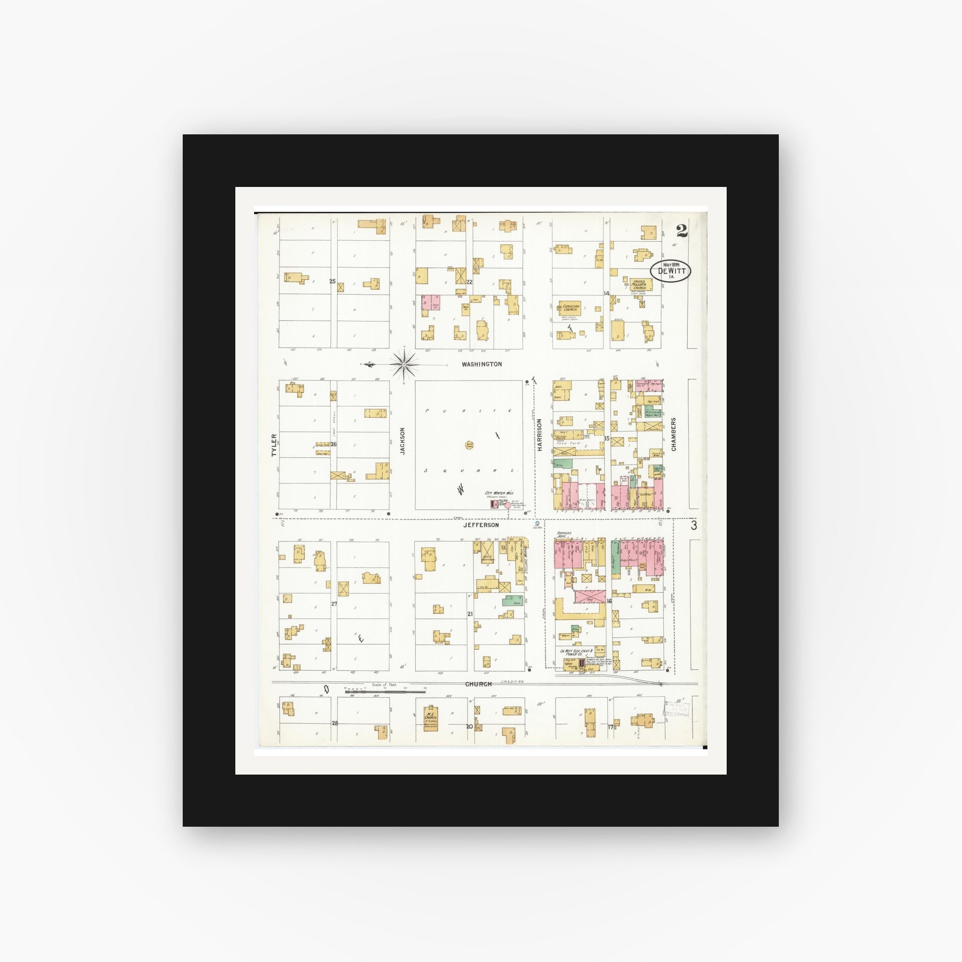 Old map wall art mockup — black gallery frame with white mat — Sanborn Fire Insurance Map from De Witt, Clinton County, Iowa (1899), Sheet #0002