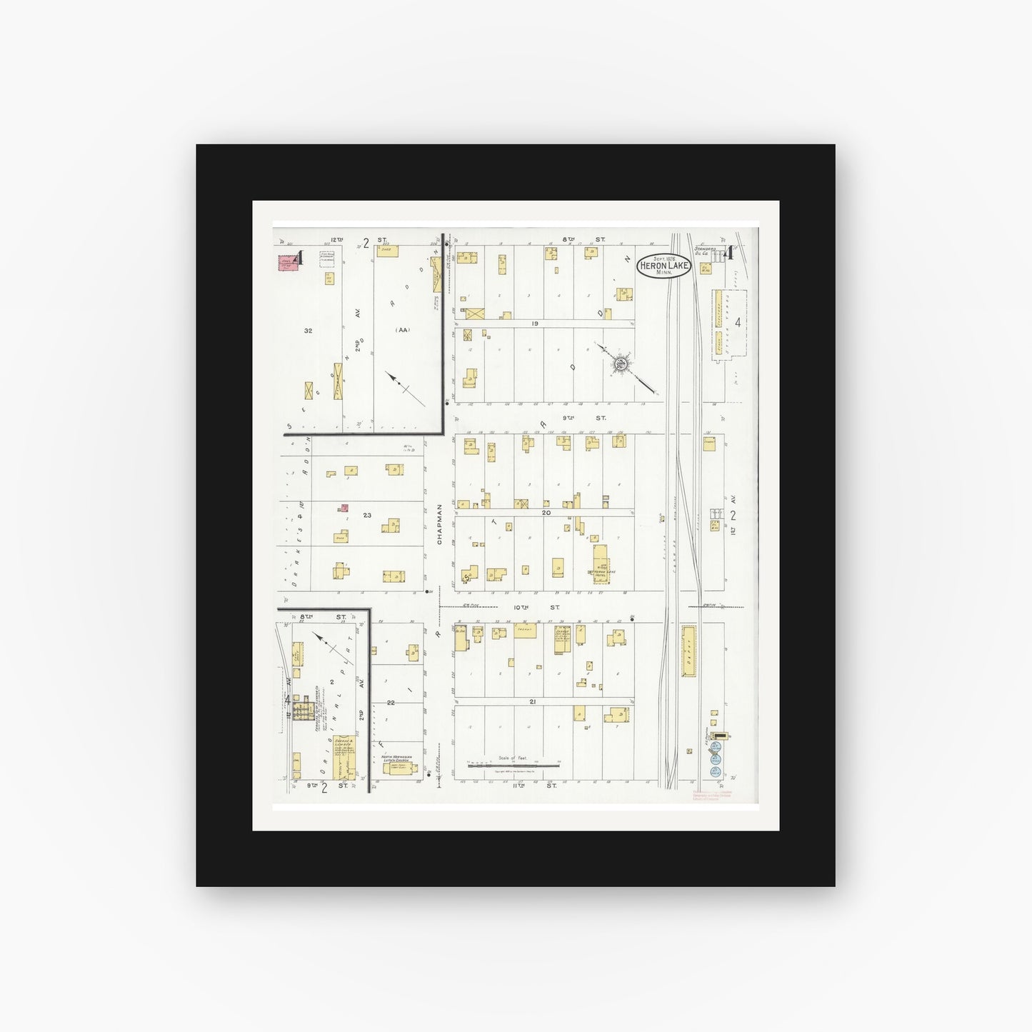 Old map wall art mockup — black gallery frame with white mat — Sanborn Fire Insurance Map from Heron Lake, Jackson County, Minnesota (1926), Sheet #0004